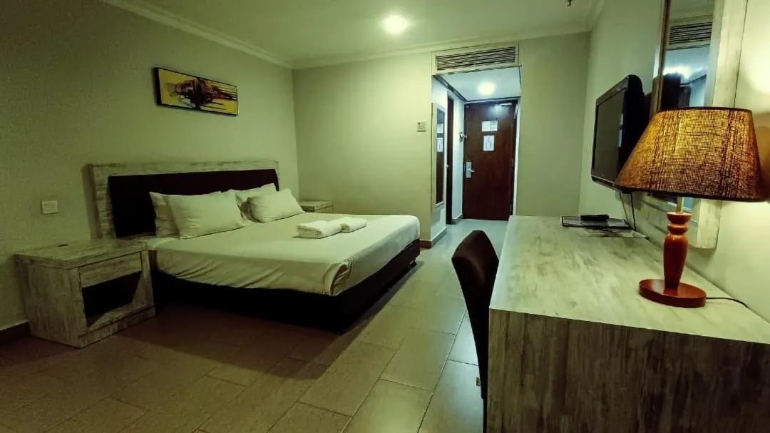 Bed in De Rhu Beach Resort