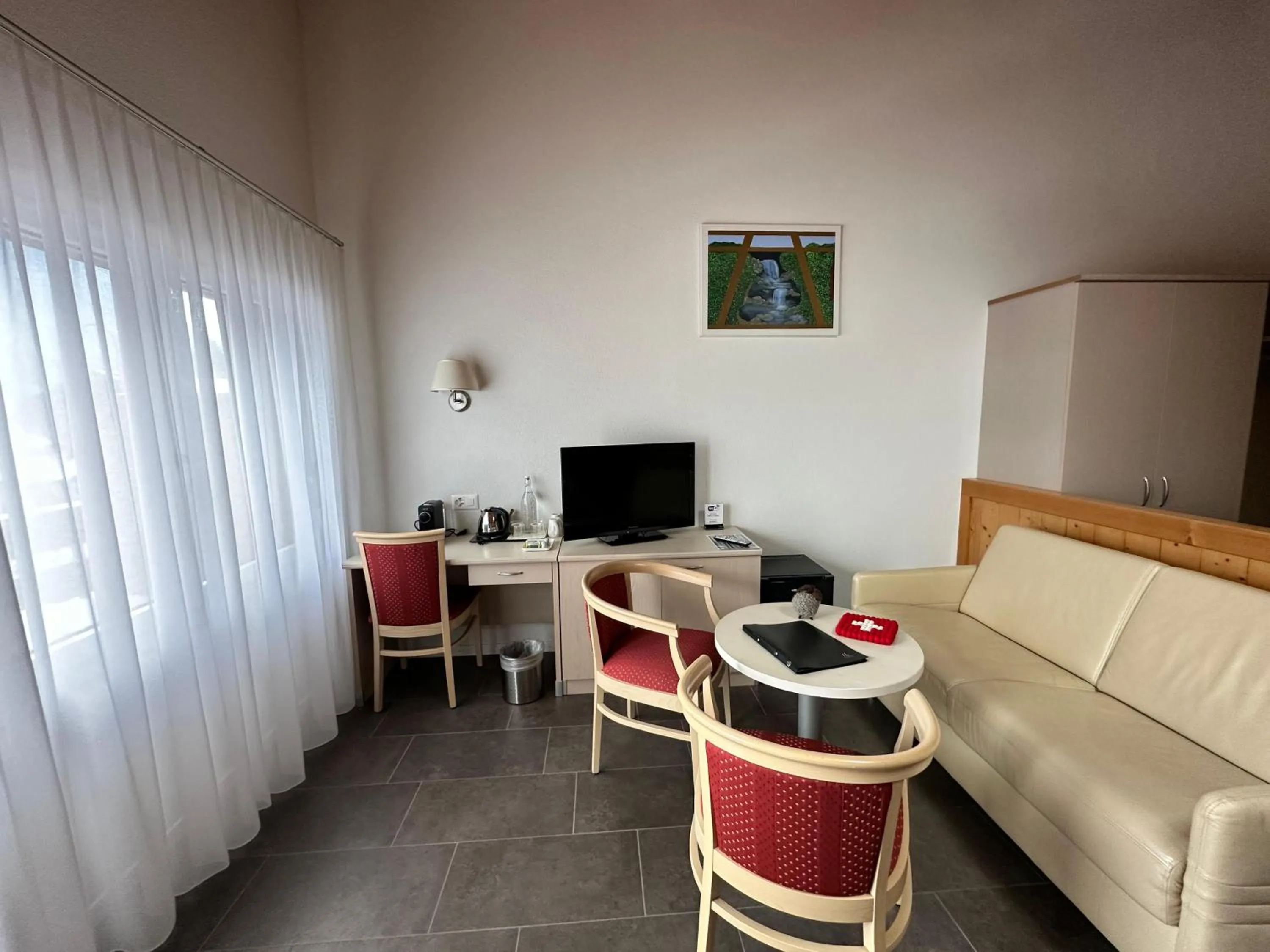 TV and multimedia in Chalet Gafri -Boutique B&B - comfort and hospitality - near Interlaken