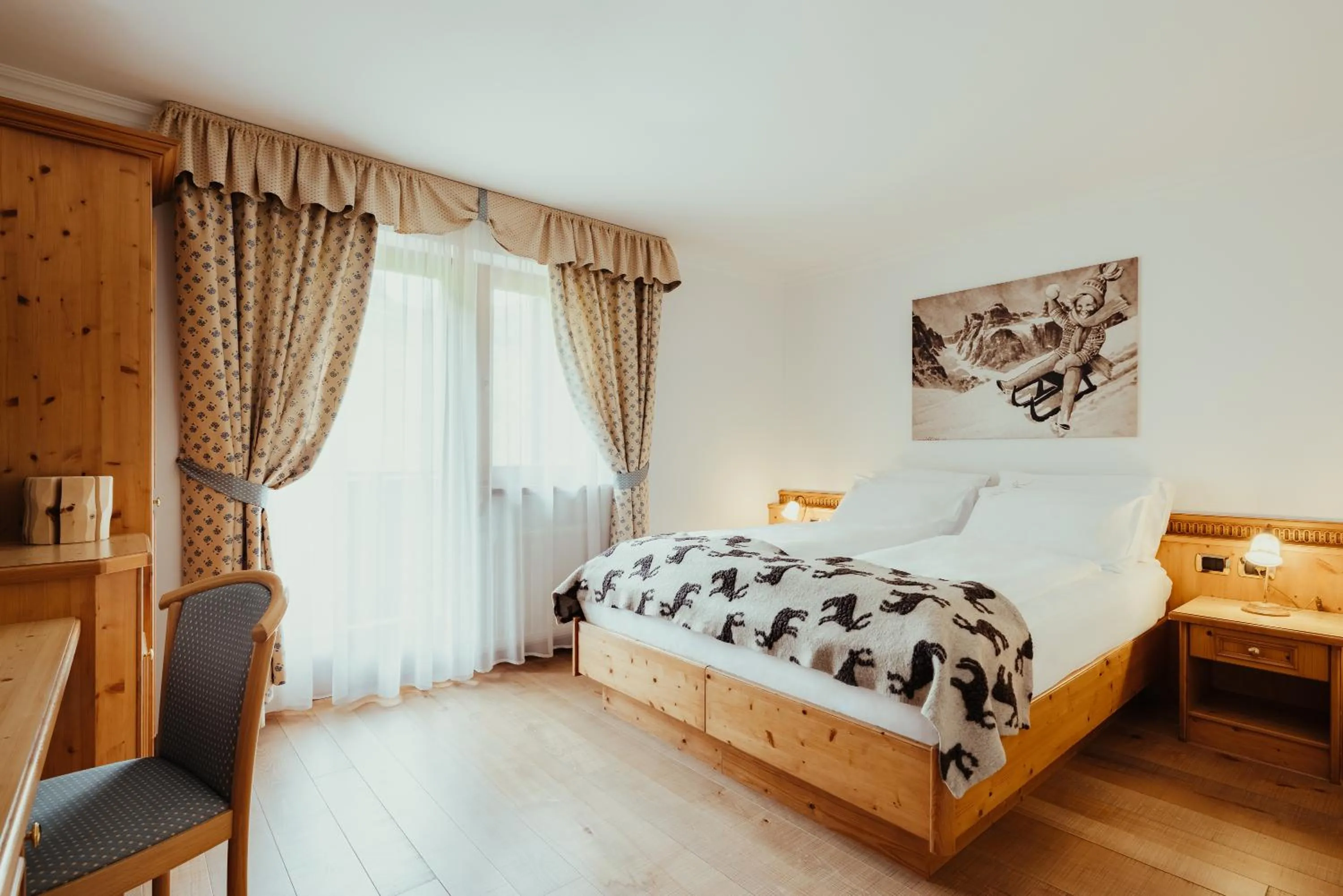 Bed in Hotel Alpenrose