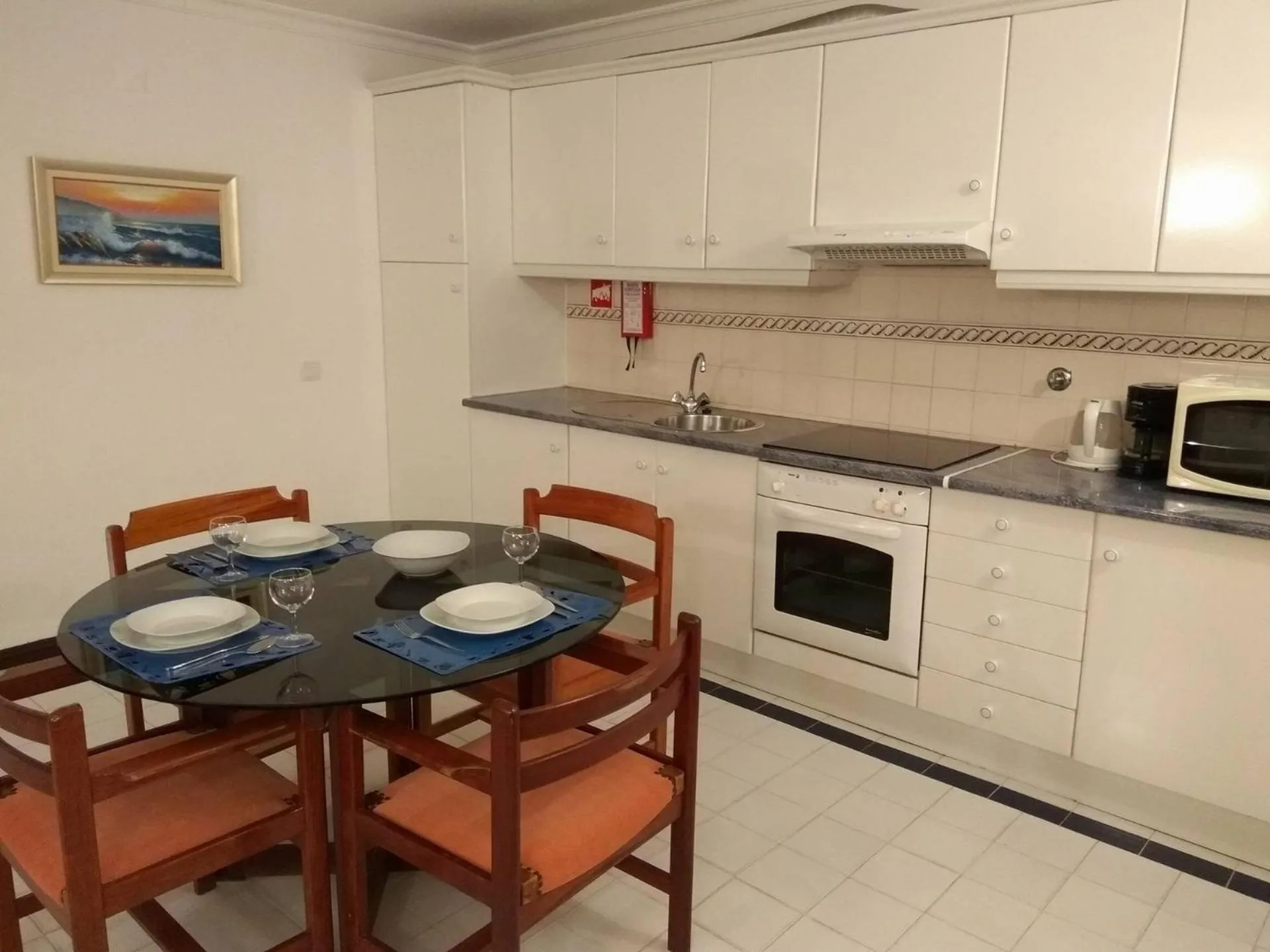 Kitchen or kitchenette in Apartamentos da Balaia