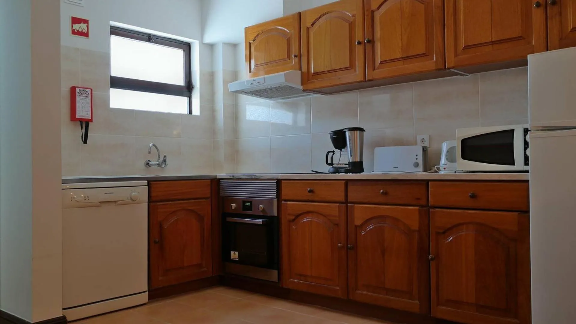 Kitchen or kitchenette in Apartamentos da Balaia