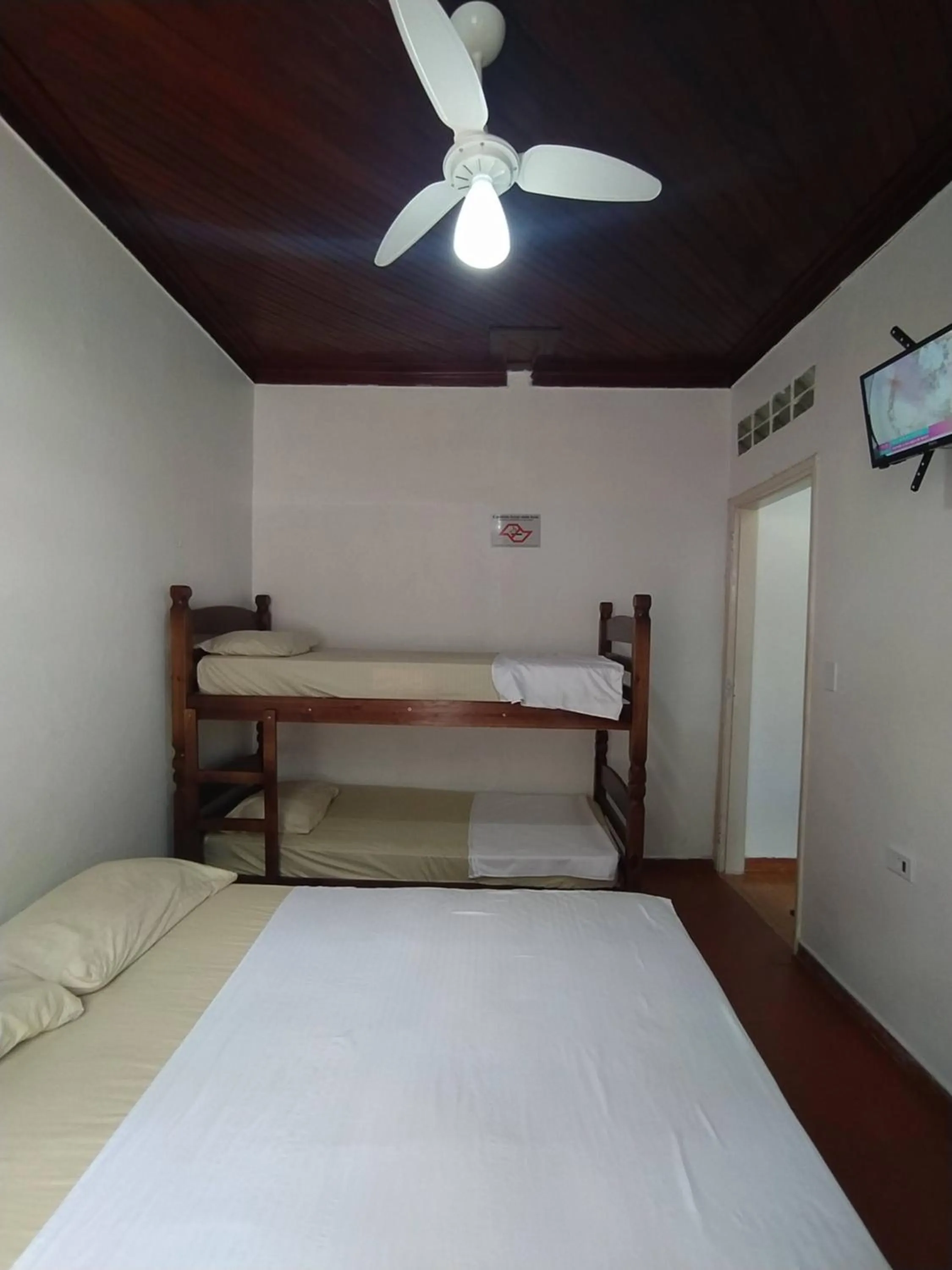 Bed in Pousada Recanto da Praia