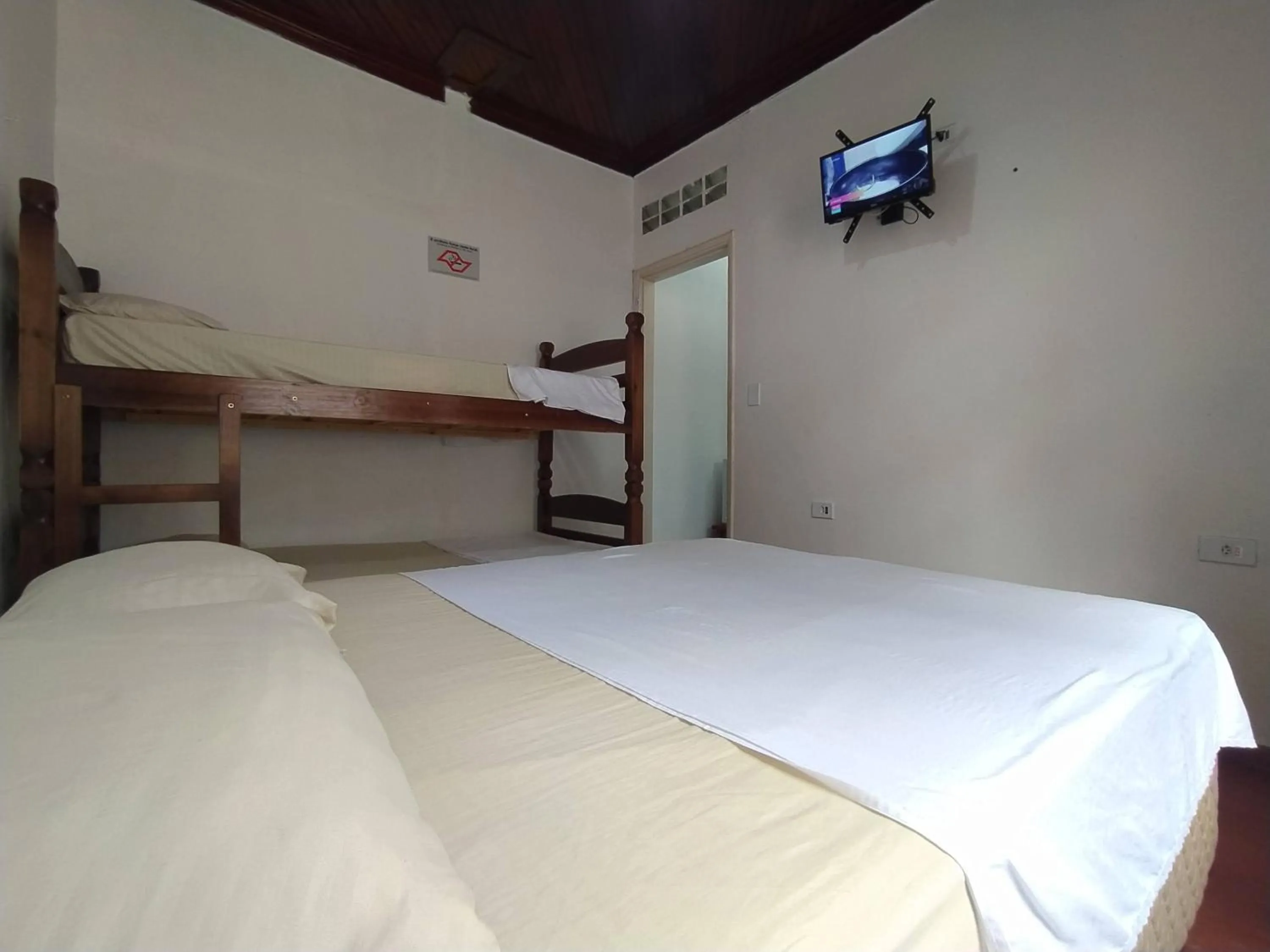 Bed in Pousada Recanto da Praia