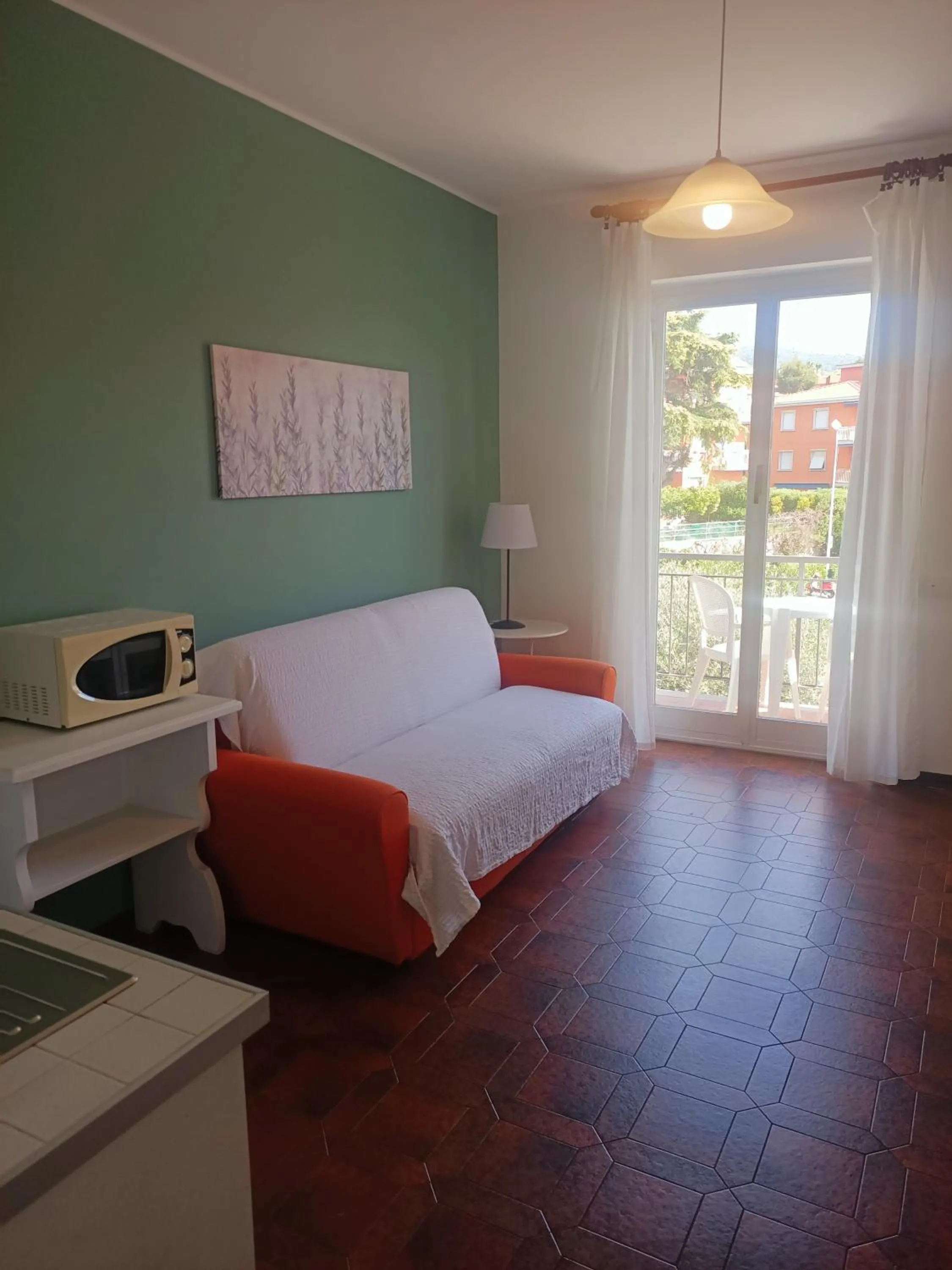 Living room, Bed in Residence La Meridiana