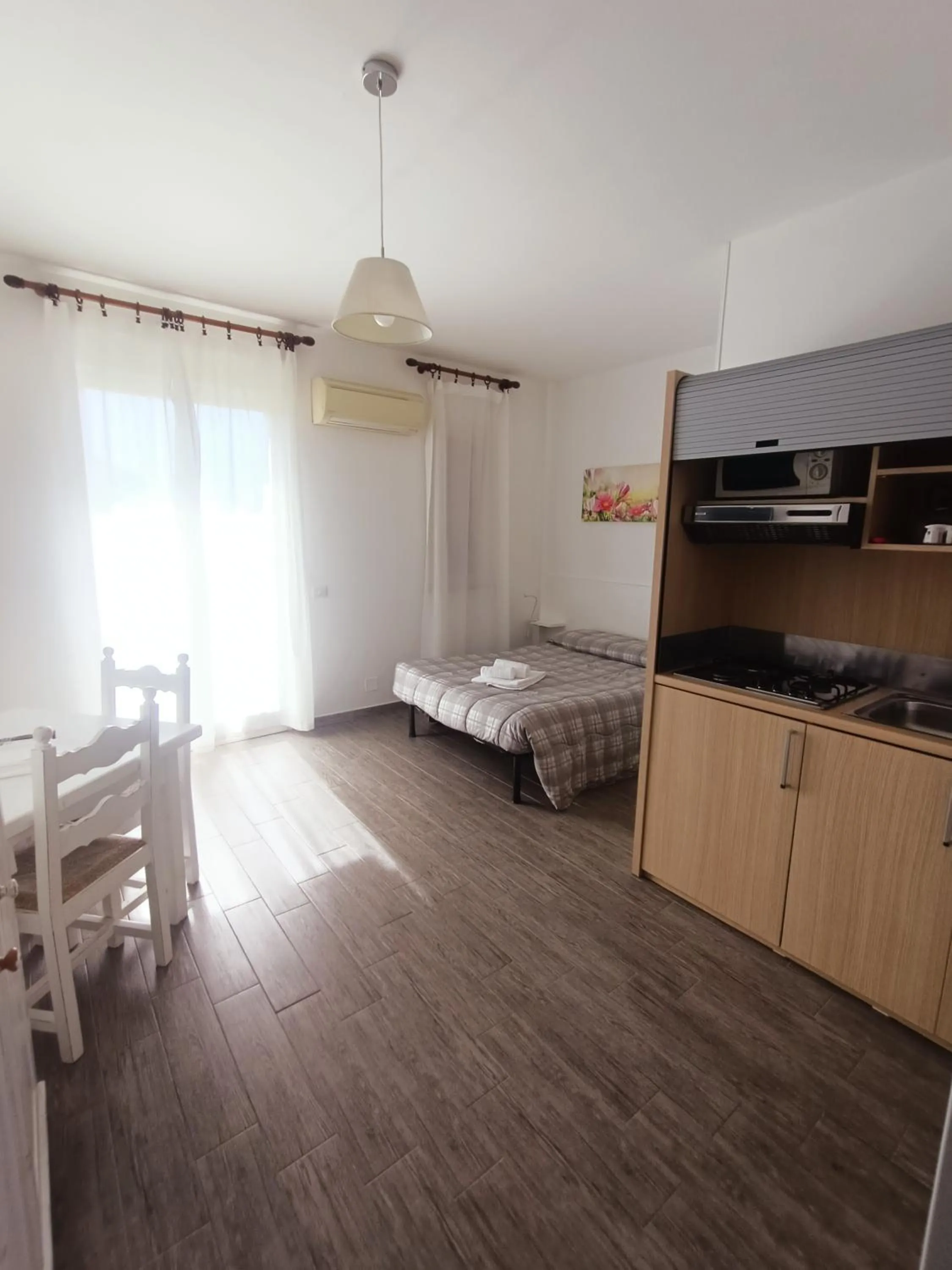 Photo of the whole room, Bed in Residence La Meridiana