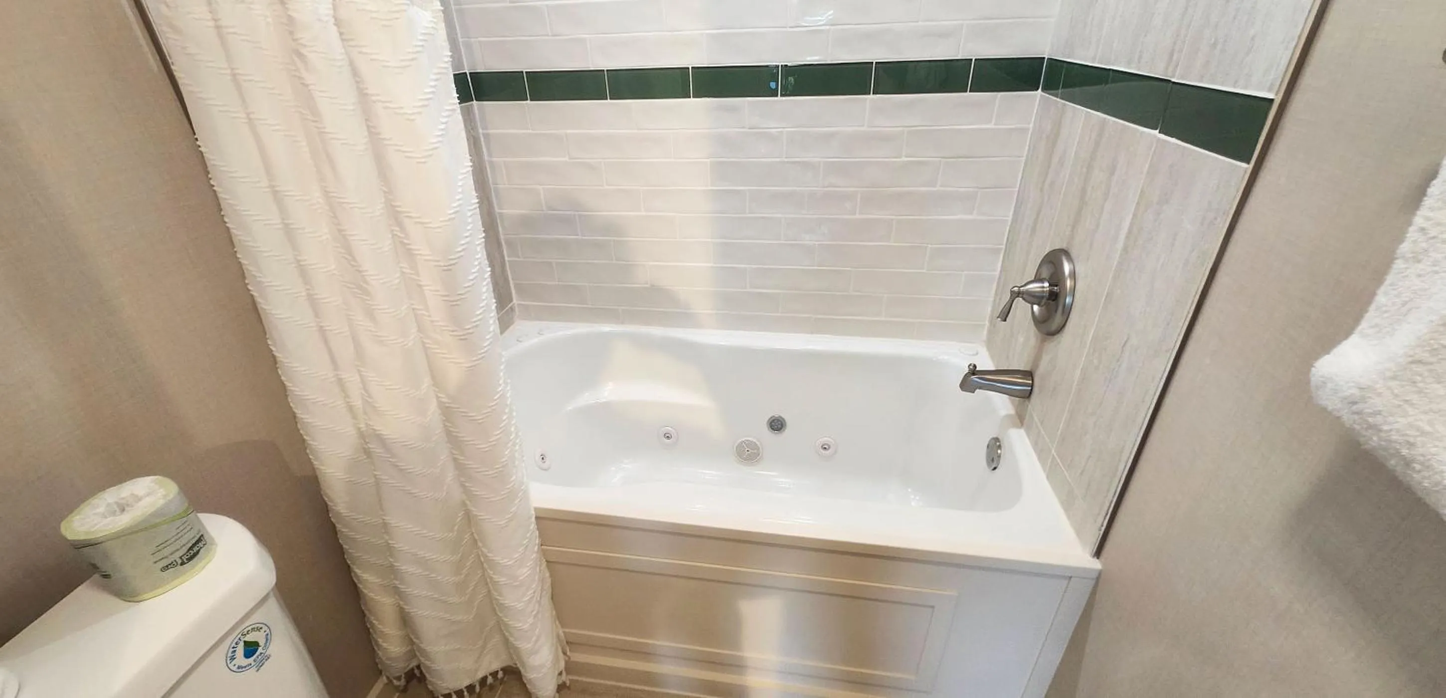 Bathroom in Arbors at Island Landing Hotel & Suites