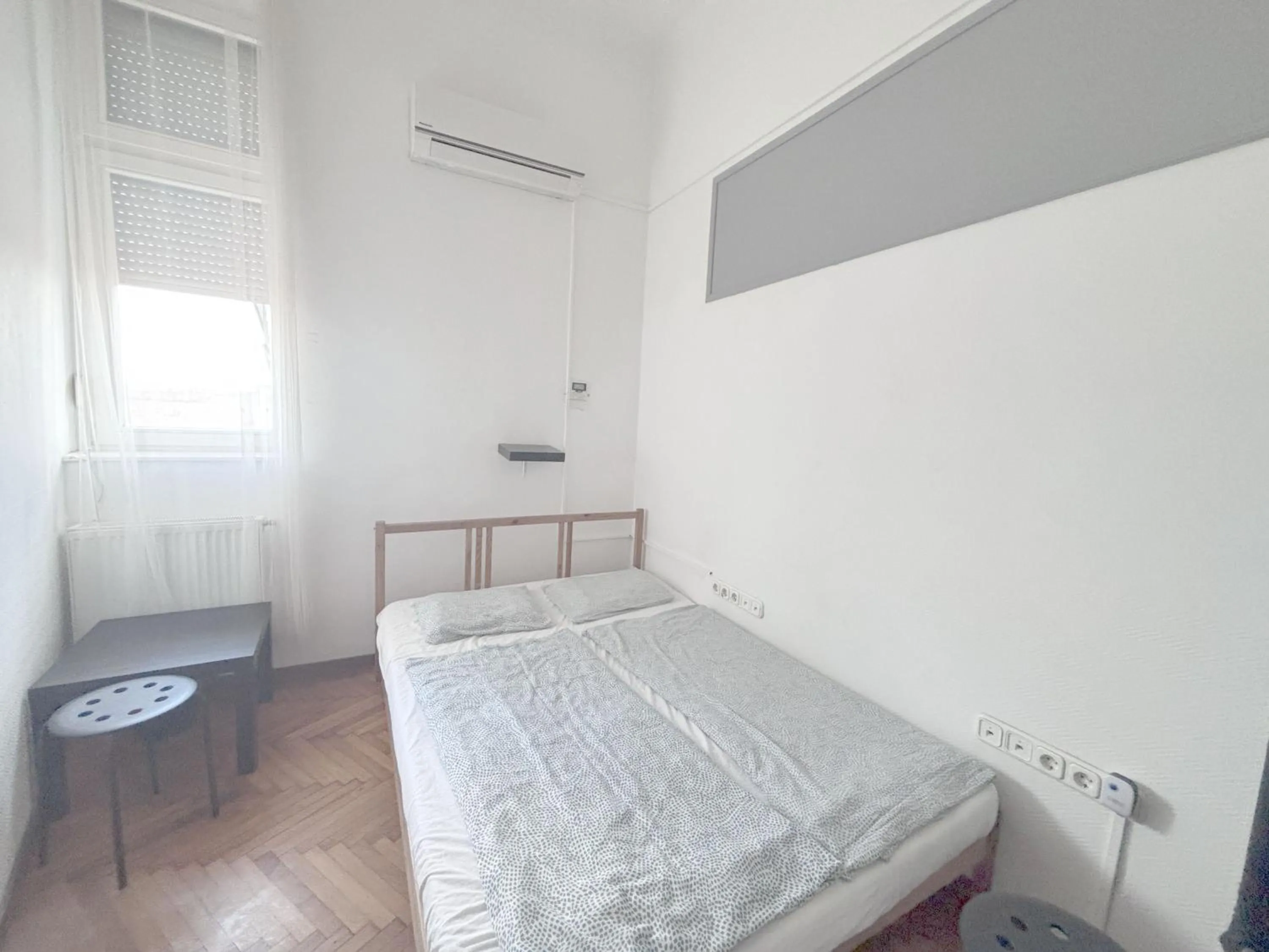 Photo of the whole room, Bed in Artist Guest House