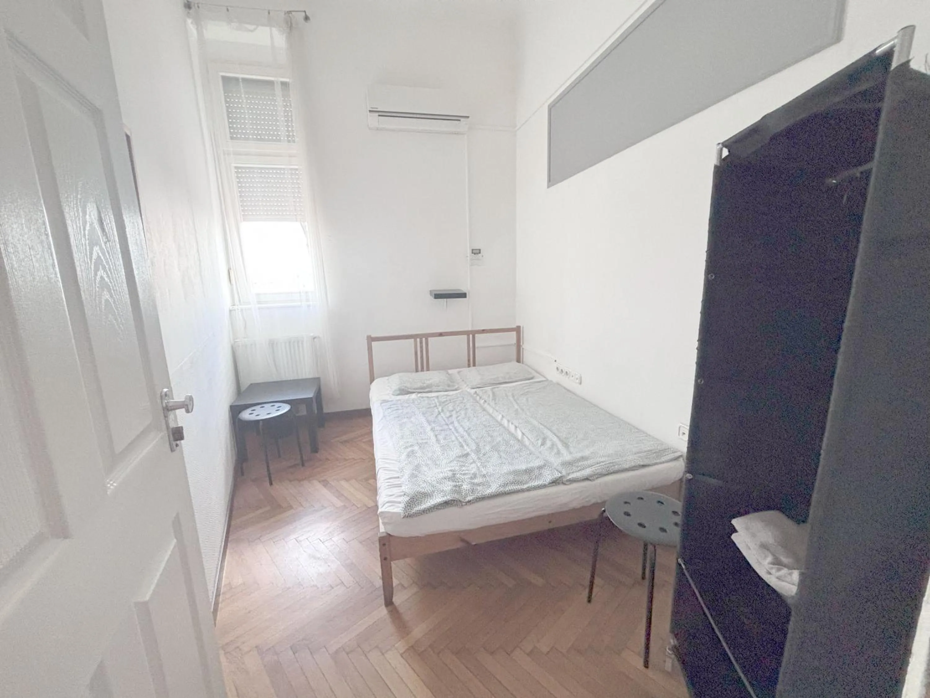 Photo of the whole room, Bed in Artist Guest House