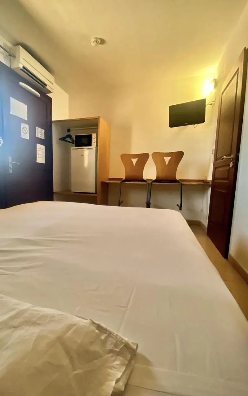 Bed in Hôtel Acajou