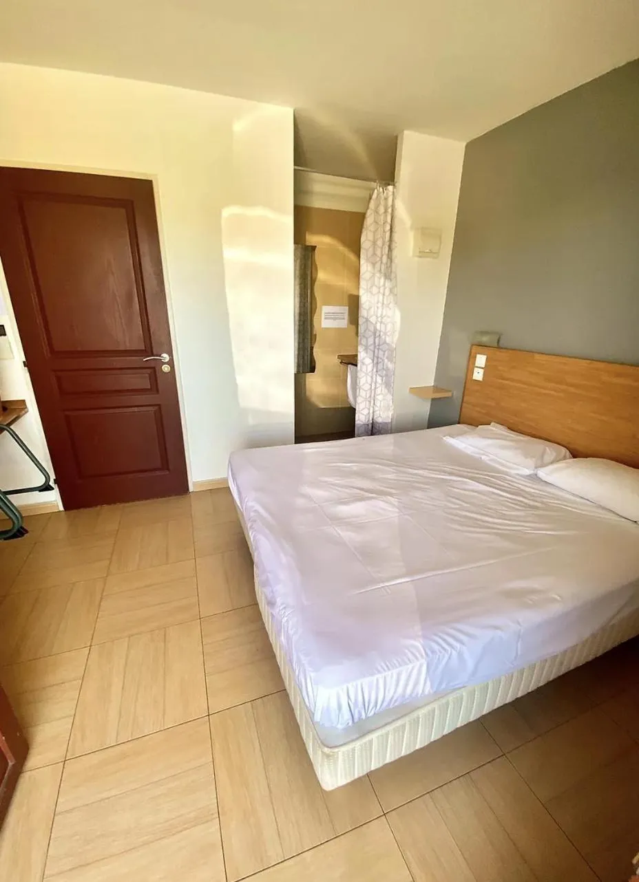 Bed in Hôtel Acajou