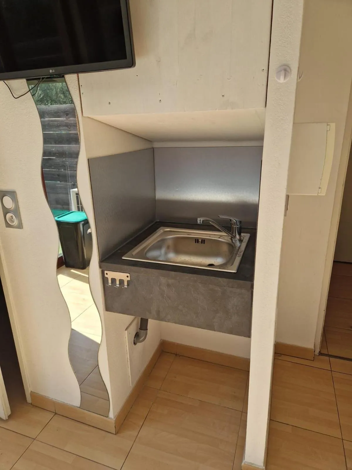 Kitchen or kitchenette in Hôtel Acajou