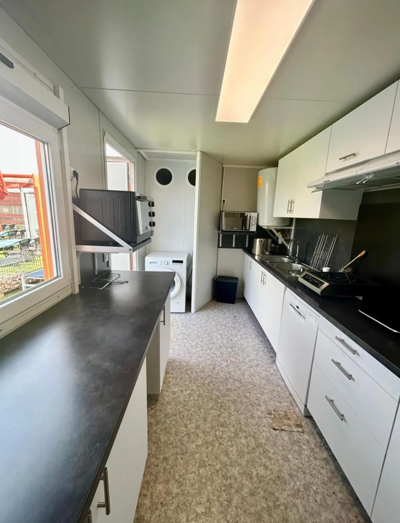 Kitchen or kitchenette in Hôtel Acajou