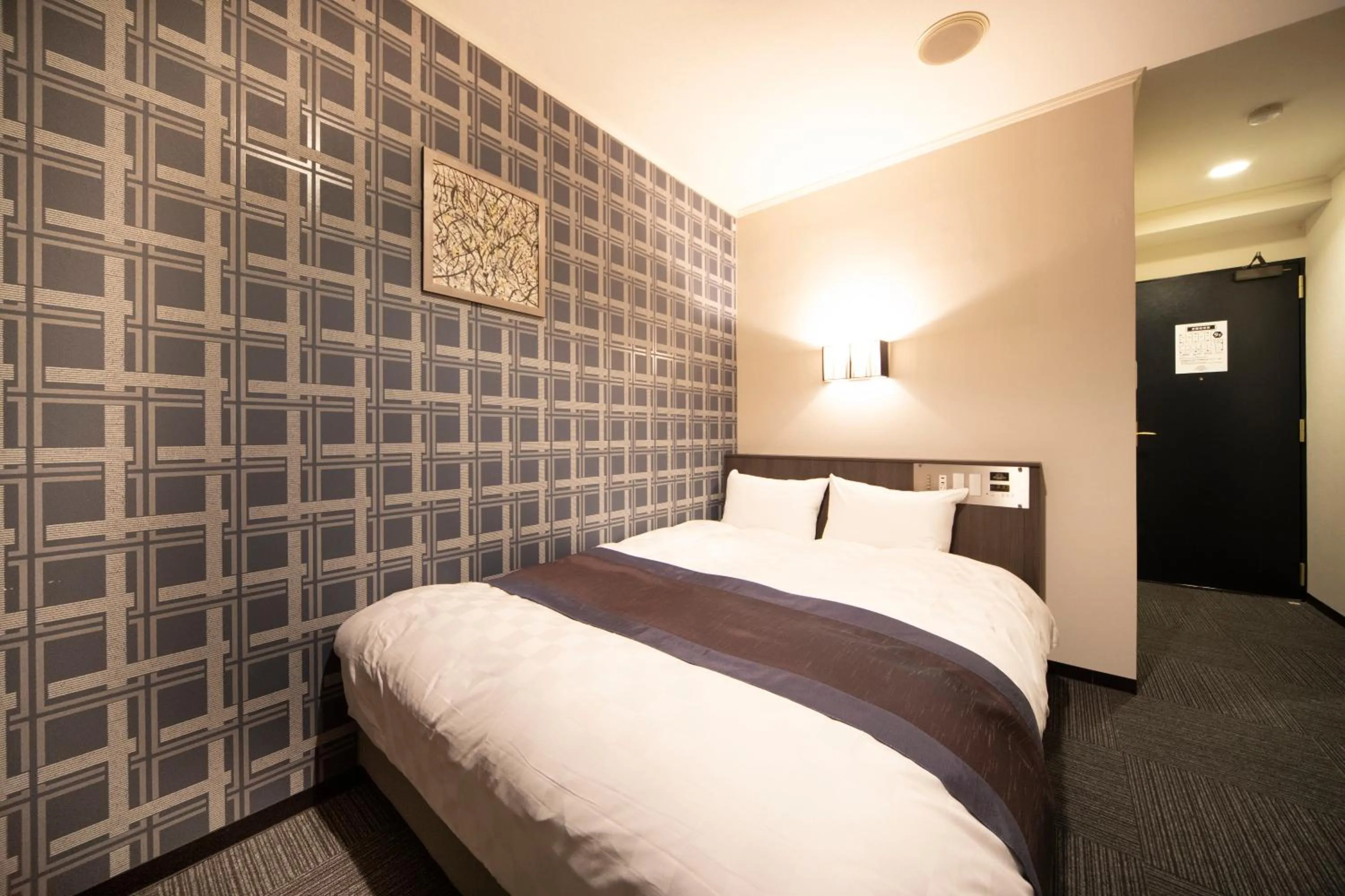 Bed in The Grandeur Hotel