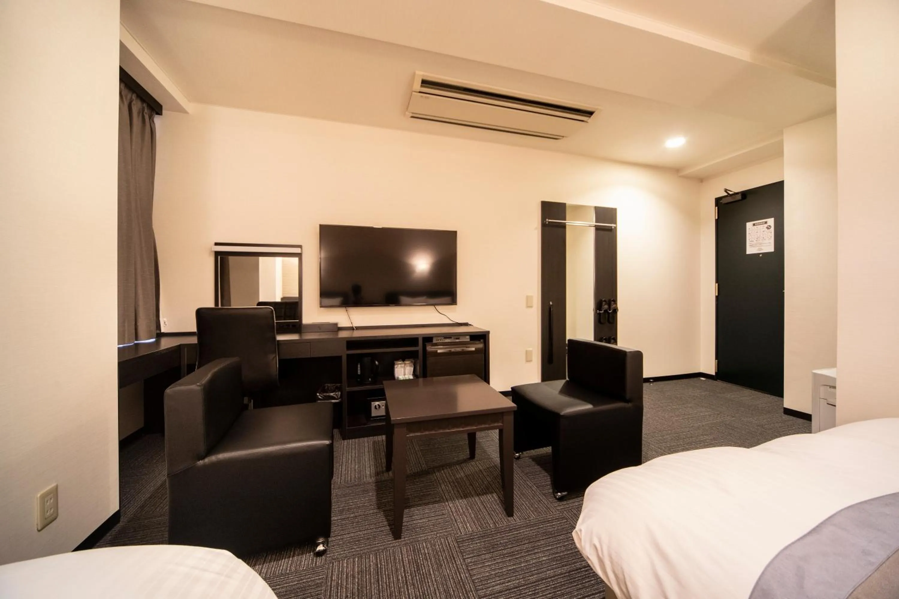 Bed in The Grandeur Hotel