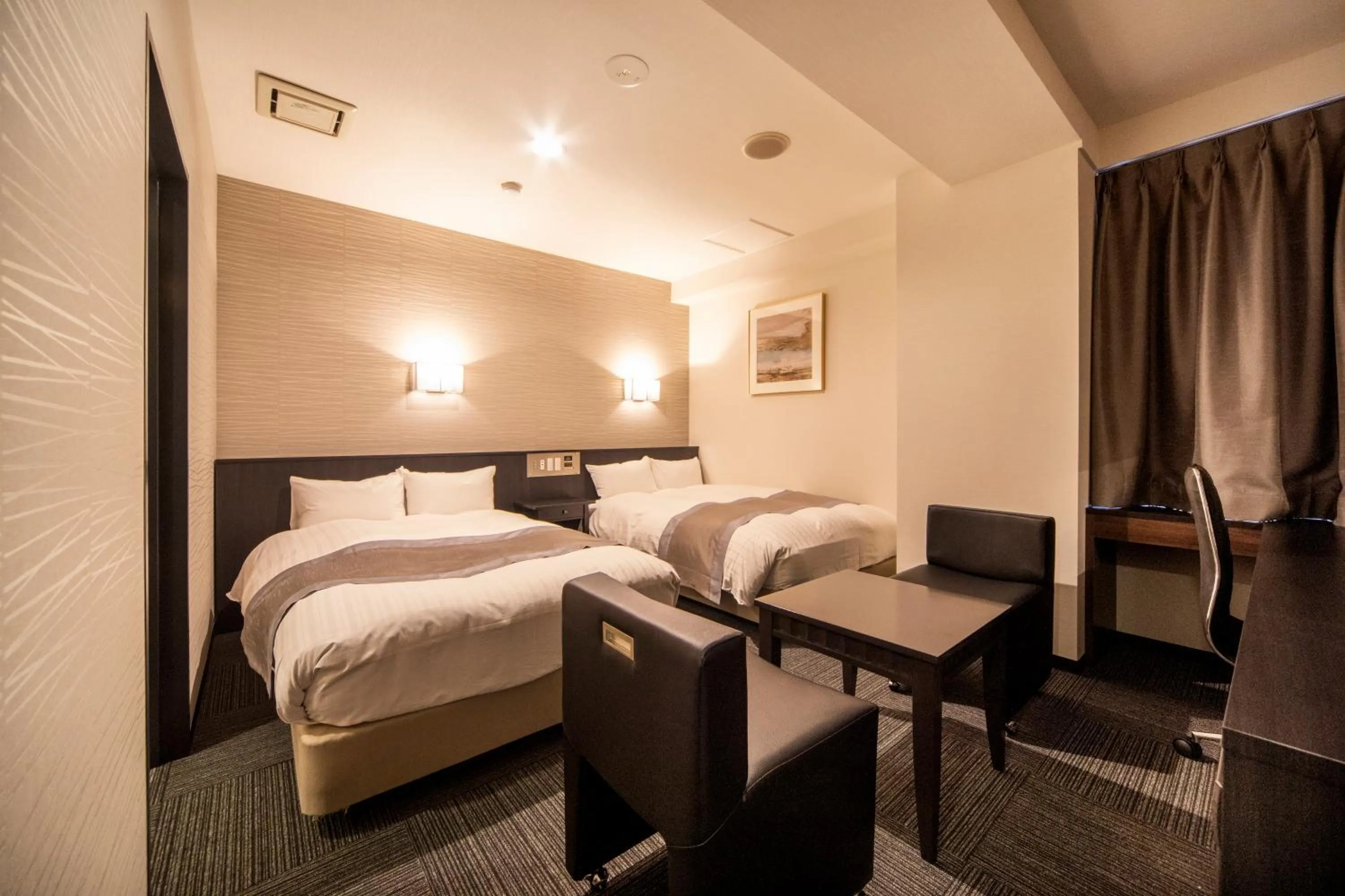 Bed in The Grandeur Hotel