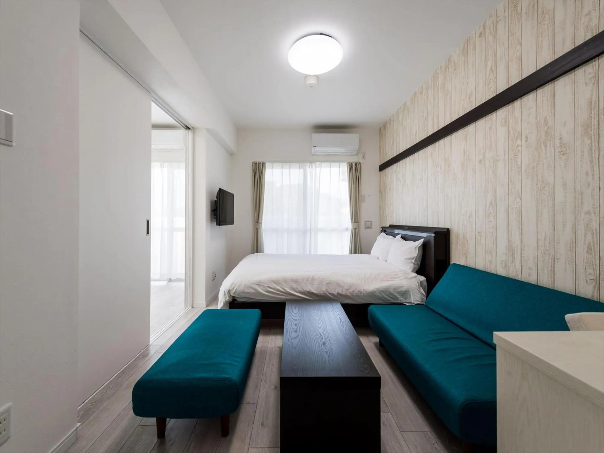 Bed in Hotel Tomas Nago