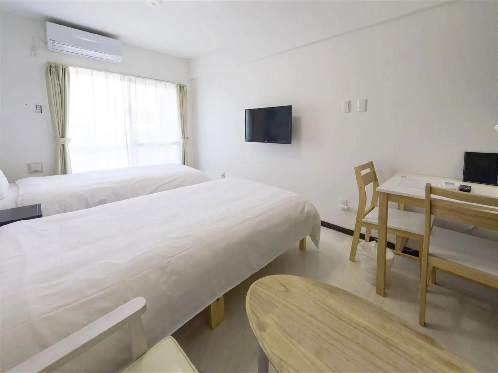 Bed in Hotel Tomas Nago