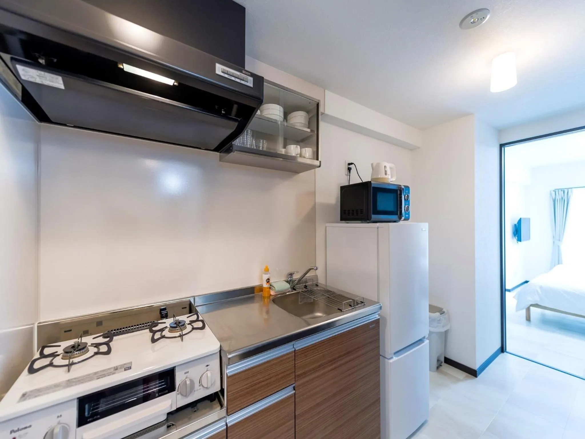 Kitchen or kitchenette in Hotel Tomas Nago
