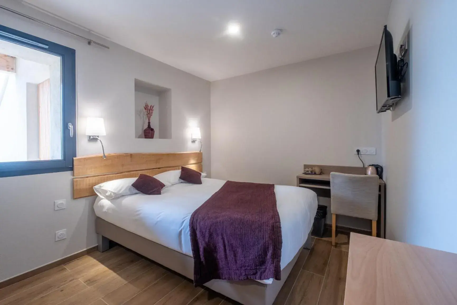 Photo of the whole room, Bed in Logis Hôtel Les Vieilles Granges Photo of the whole room, Bed in Logis Hôtel Les Vieilles Granges