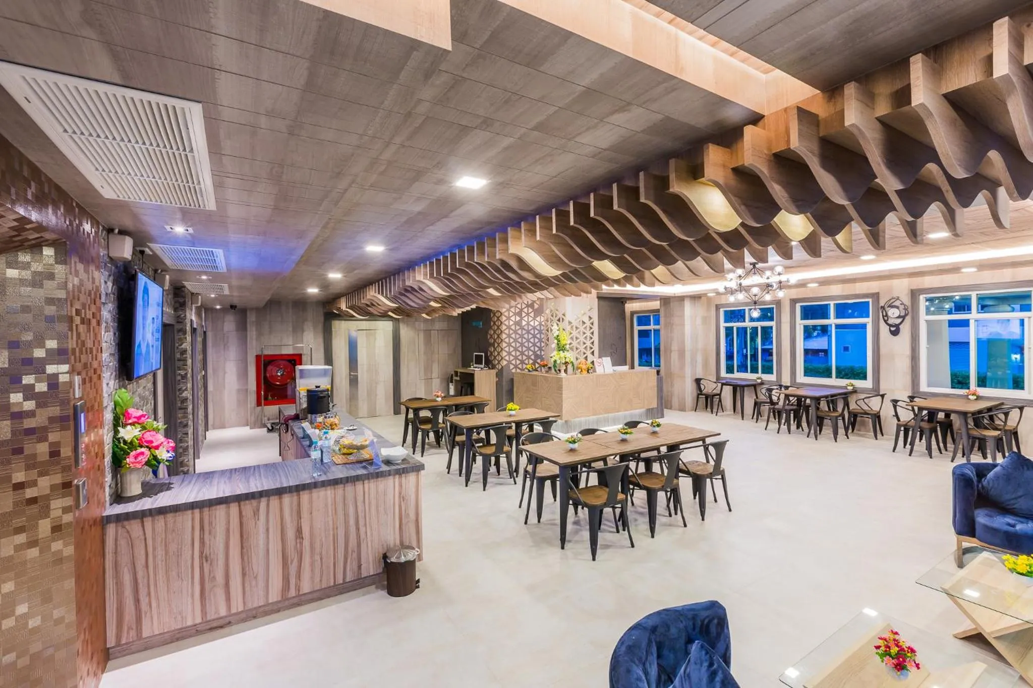 Communal lounge/ TV room in Evergreen Suite Hotel