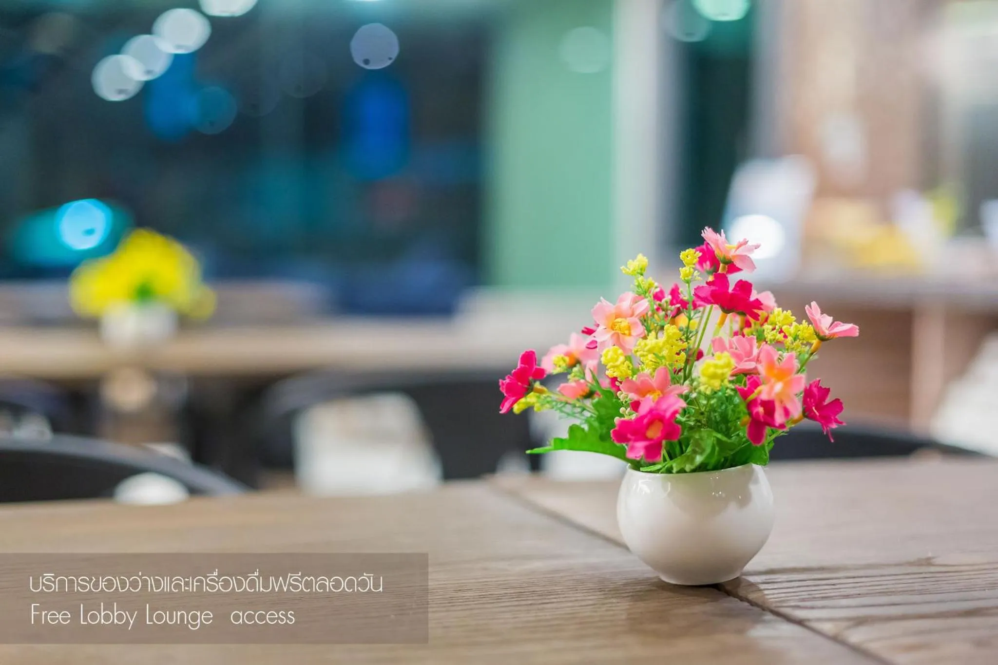 Communal lounge/ TV room in Evergreen Suite Hotel