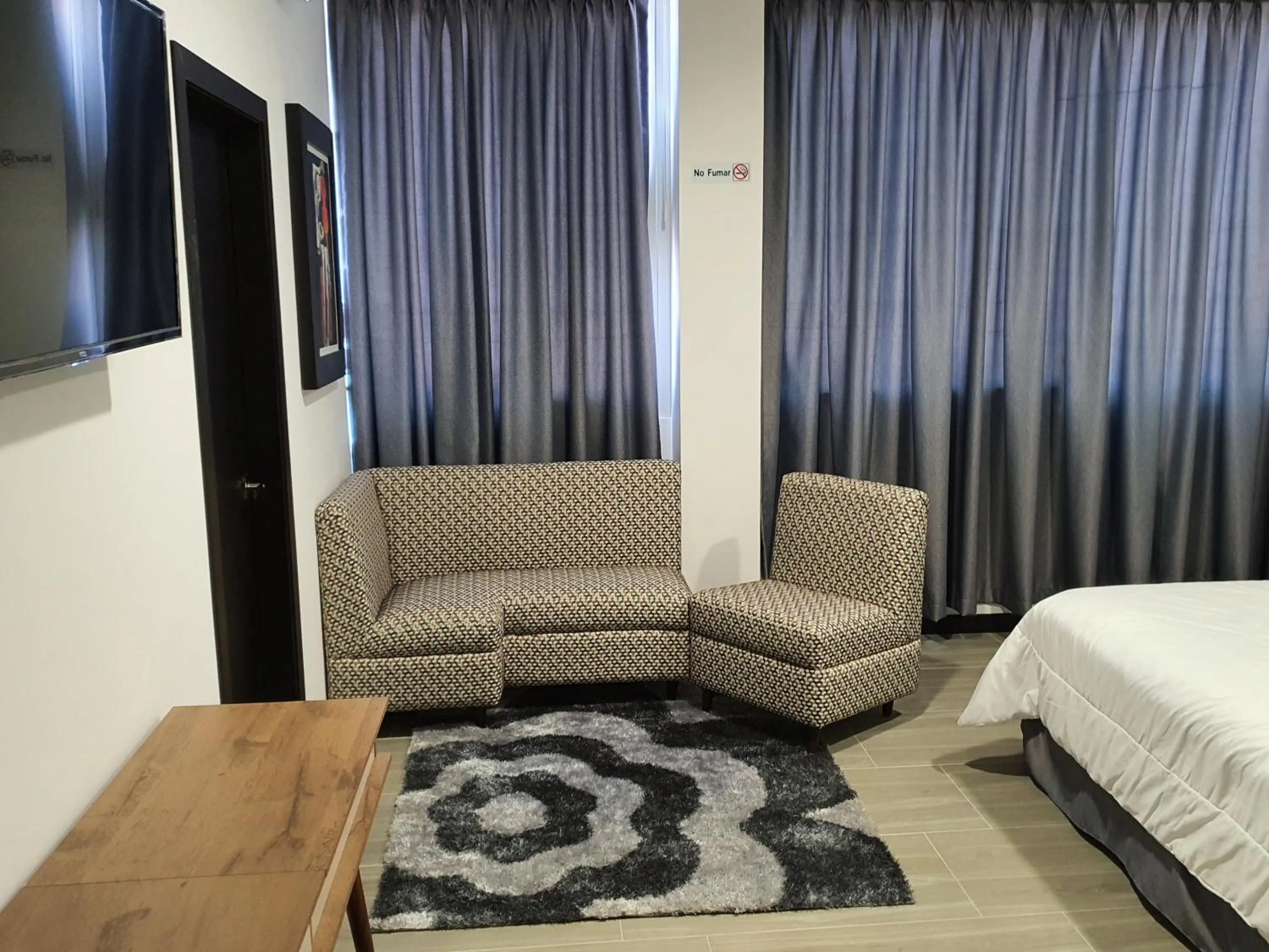 Living room, Bed in Hosteria Palmetto