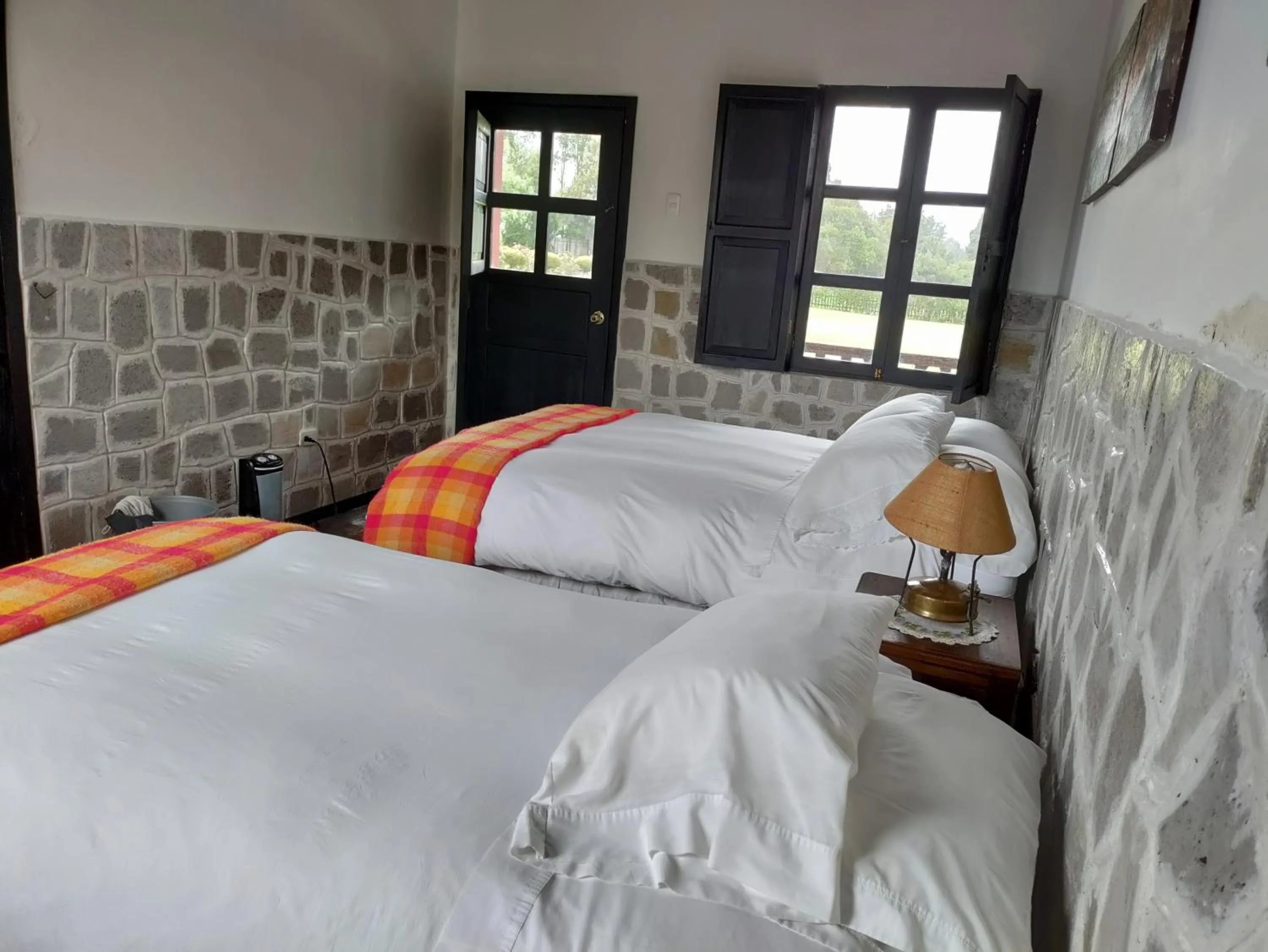 Photo of the whole room, Bed in Hacienda Hato Verde