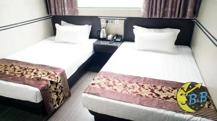 Bed in B&B Mongkok Hotel Bed in B&B Mongkok Hotel