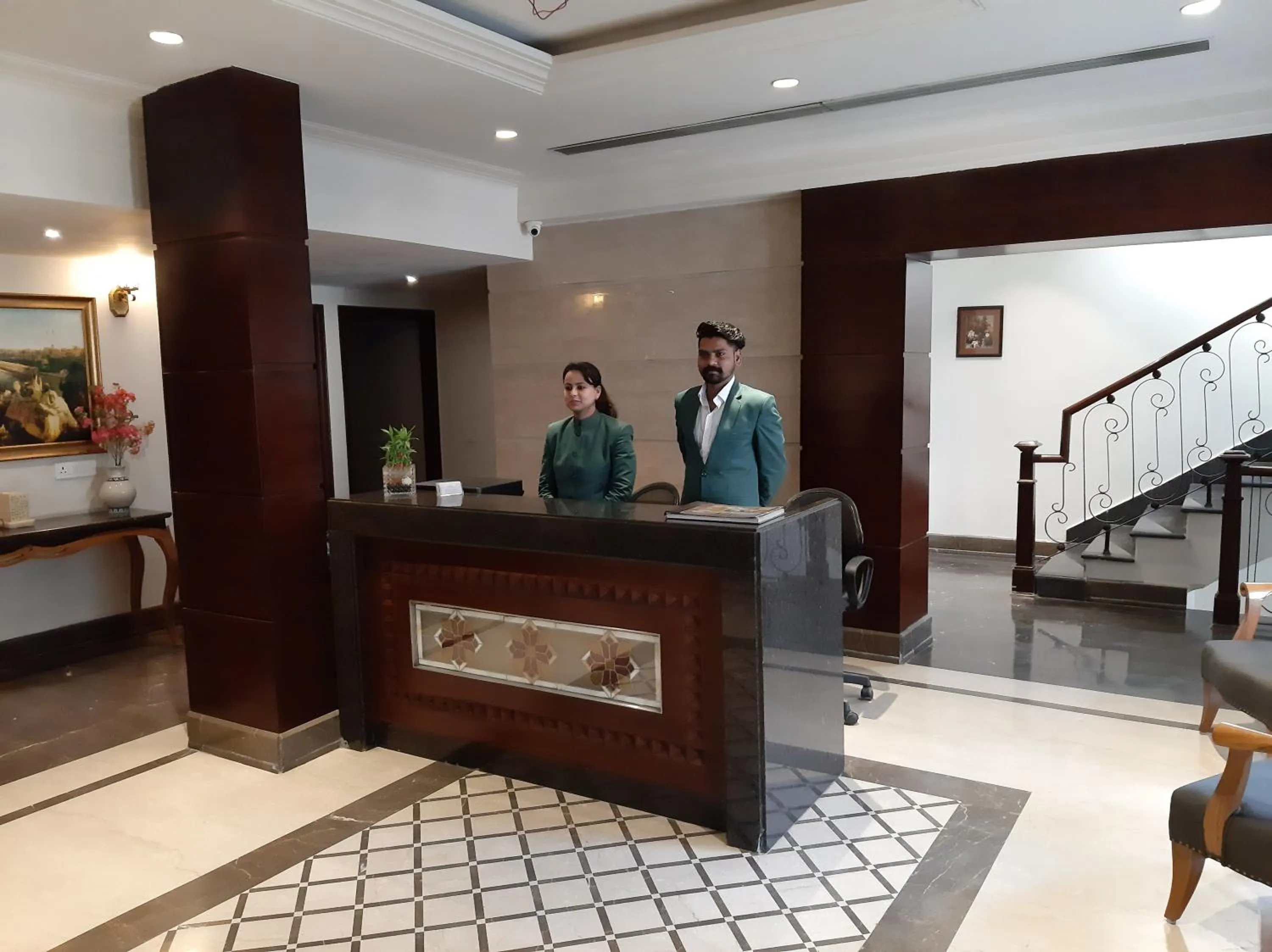 Staff in Hotel Golden Tower Near Heritage Street