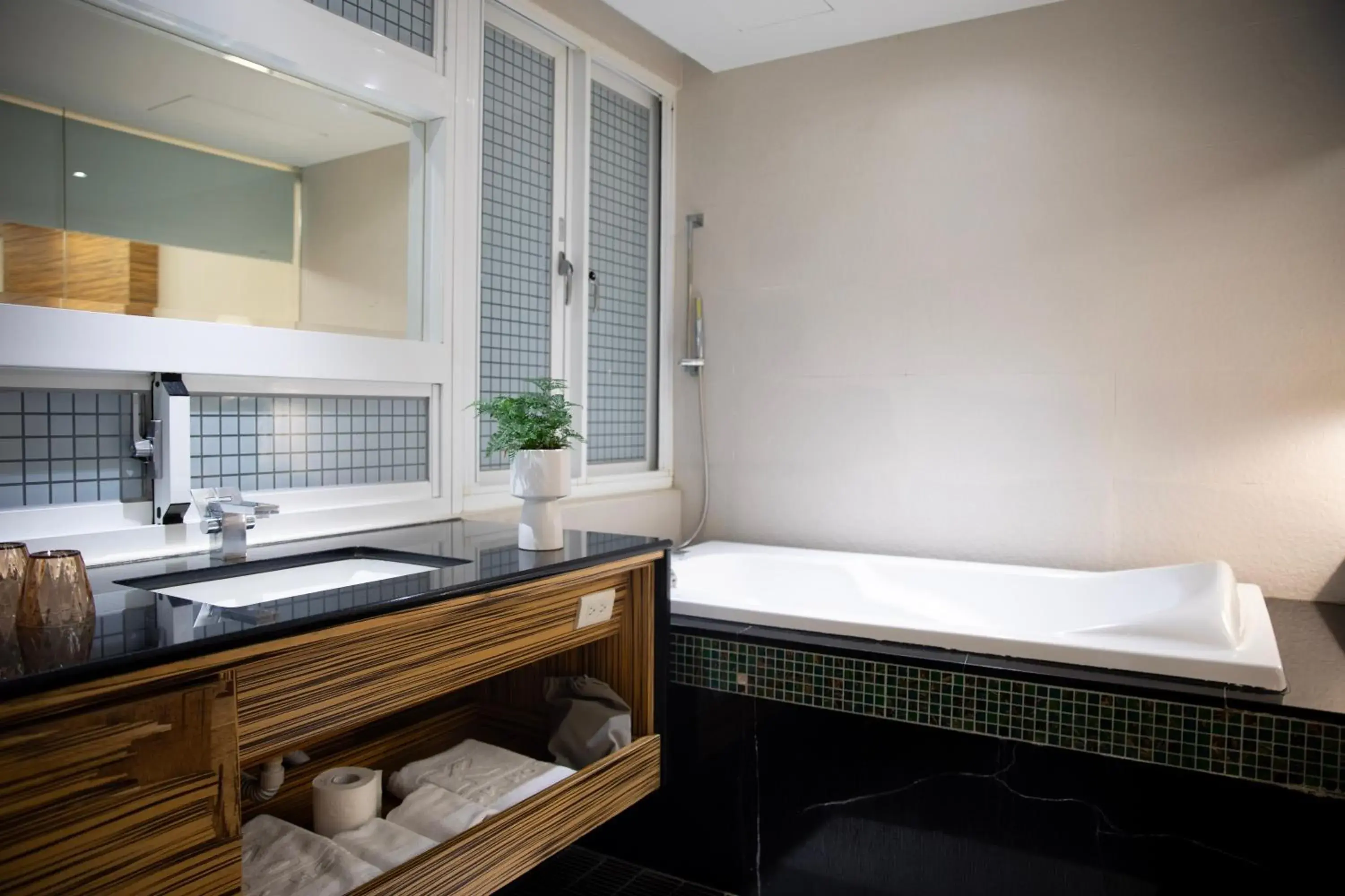 Bath, Bed in Kapok Hotel & Resorts Bath, Bed in Kapok Hotel & Resorts