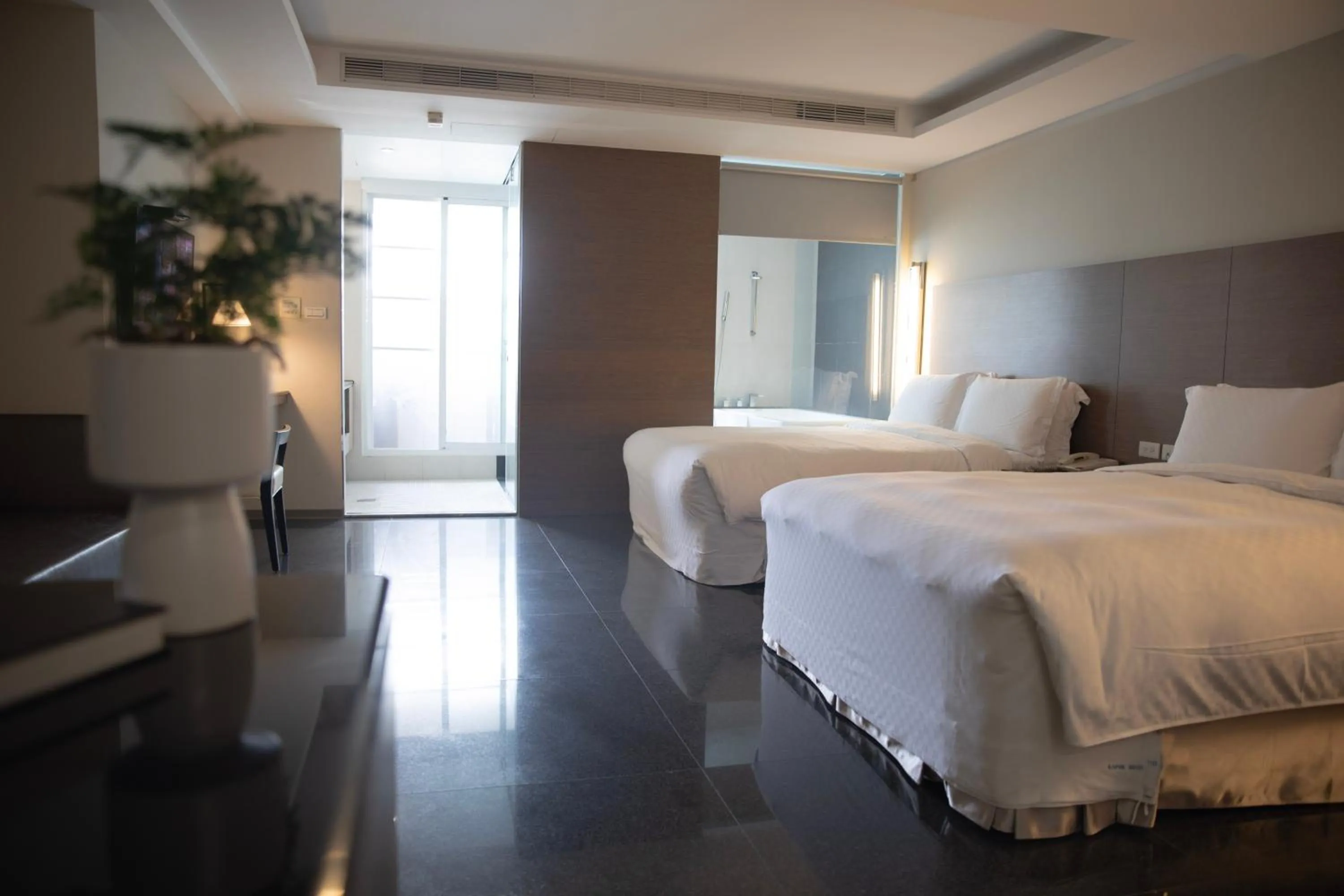 Photo of the whole room, Bed in Kapok Hotel & Resorts