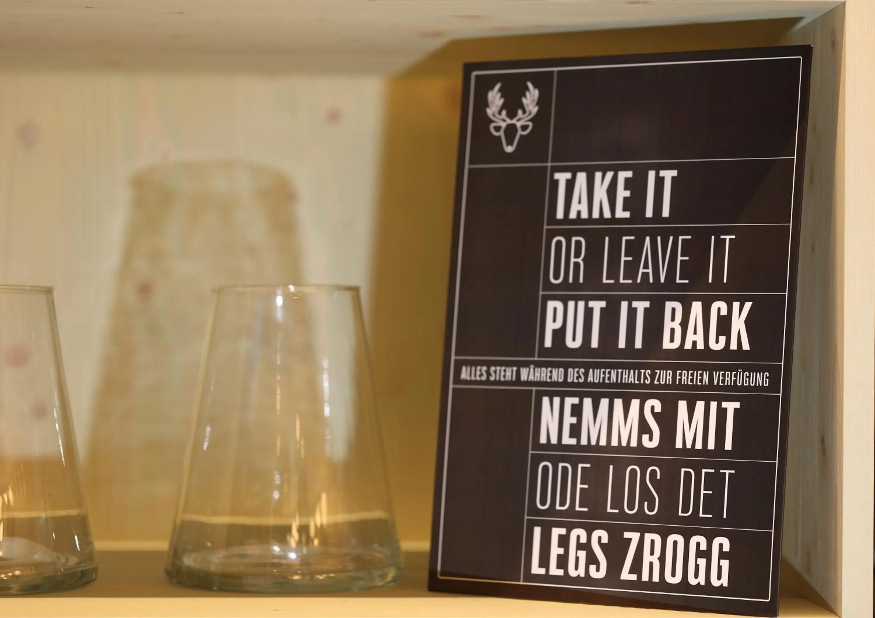 Communal lounge/ TV room in Lodge Hof Weissbad