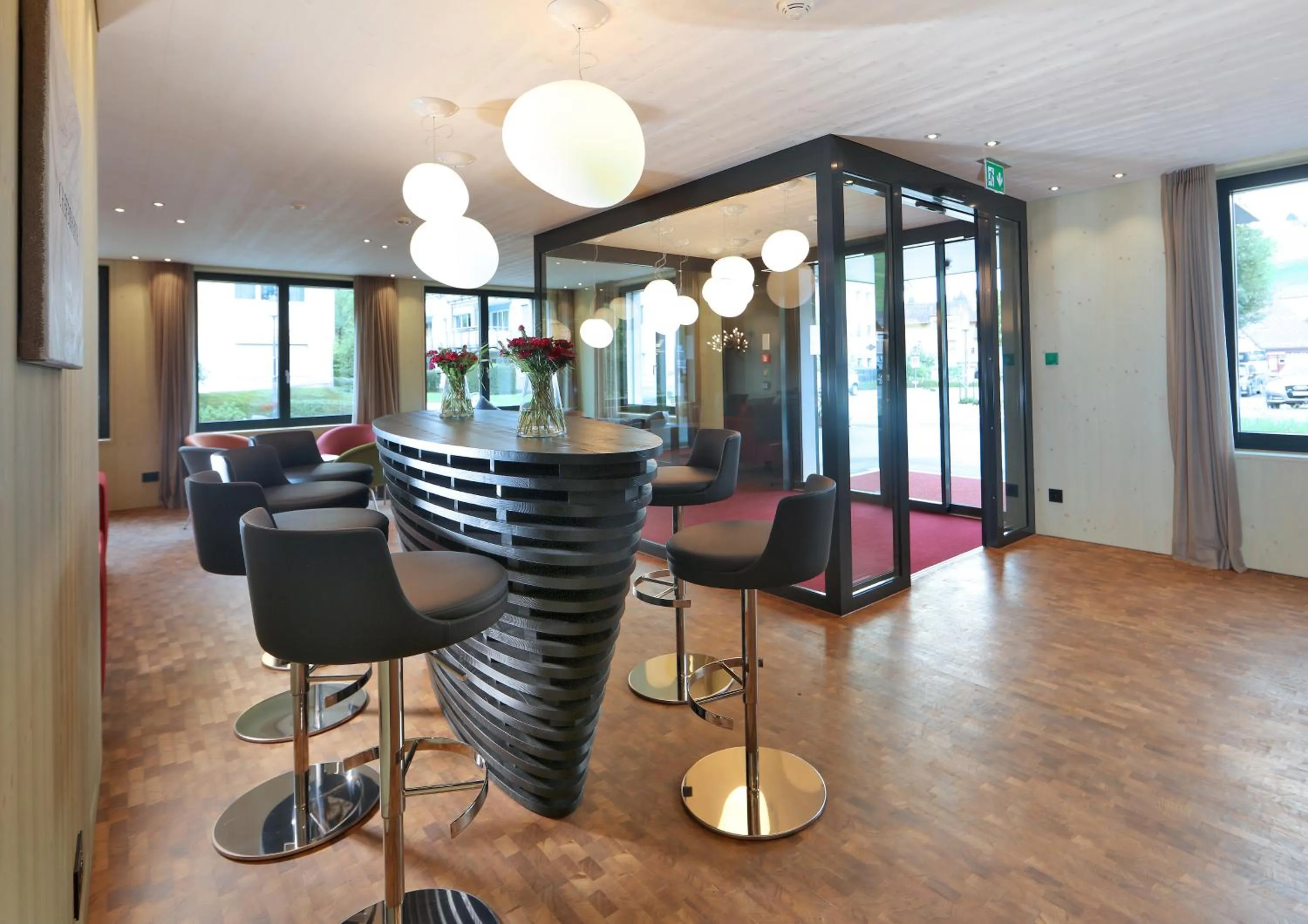 Communal lounge/ TV room in Lodge Hof Weissbad