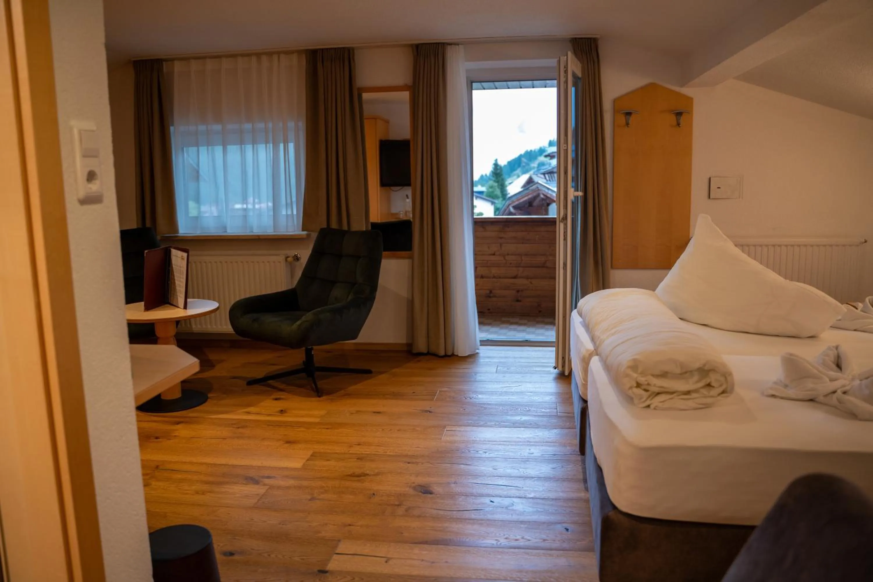 Photo of the whole room, Bed in Alpenhotel Regina