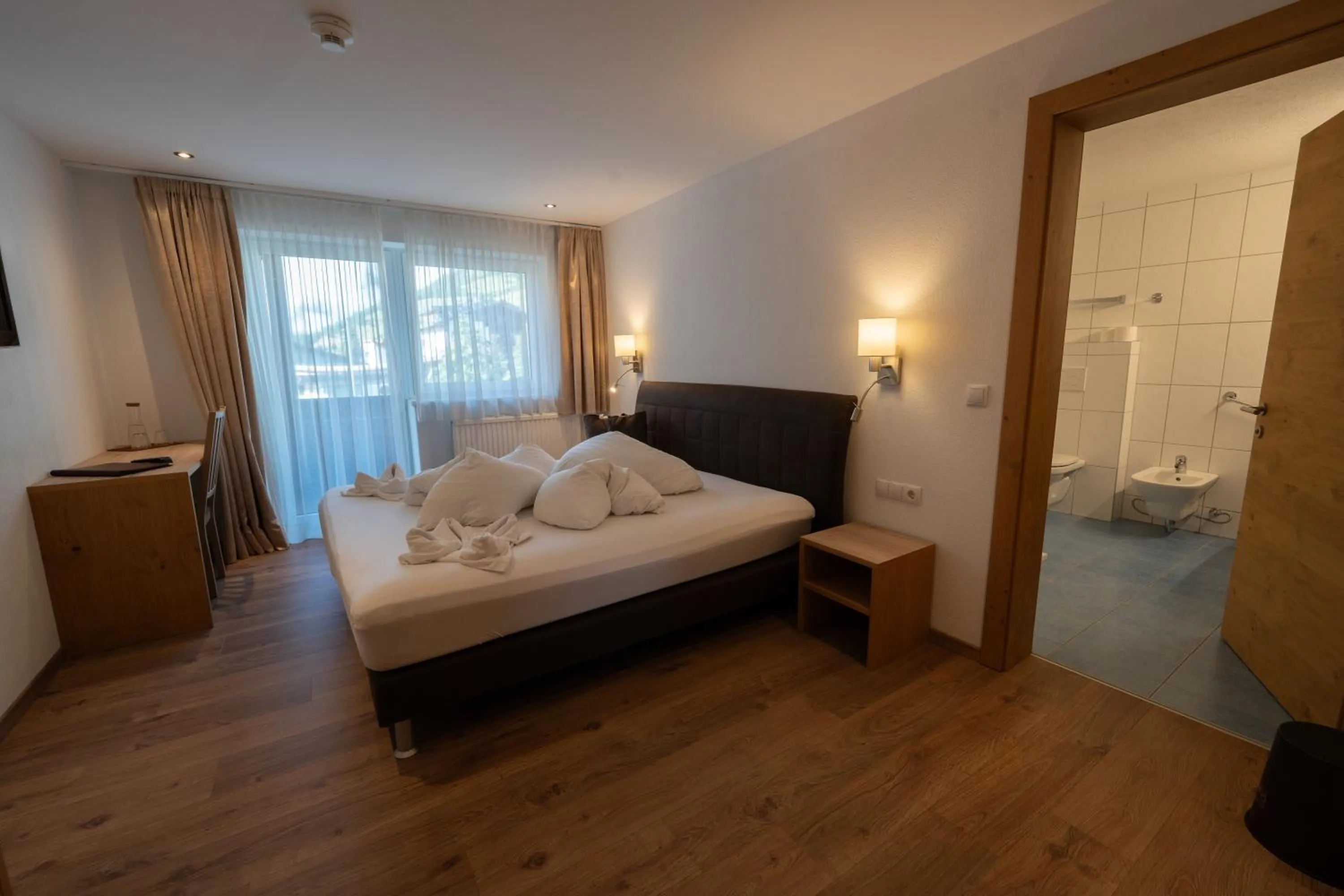 Photo of the whole room, Bed in Alpenhotel Regina