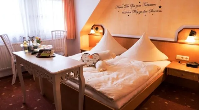 Photo of the whole room, Bed in Hotel Birkenhof Garni