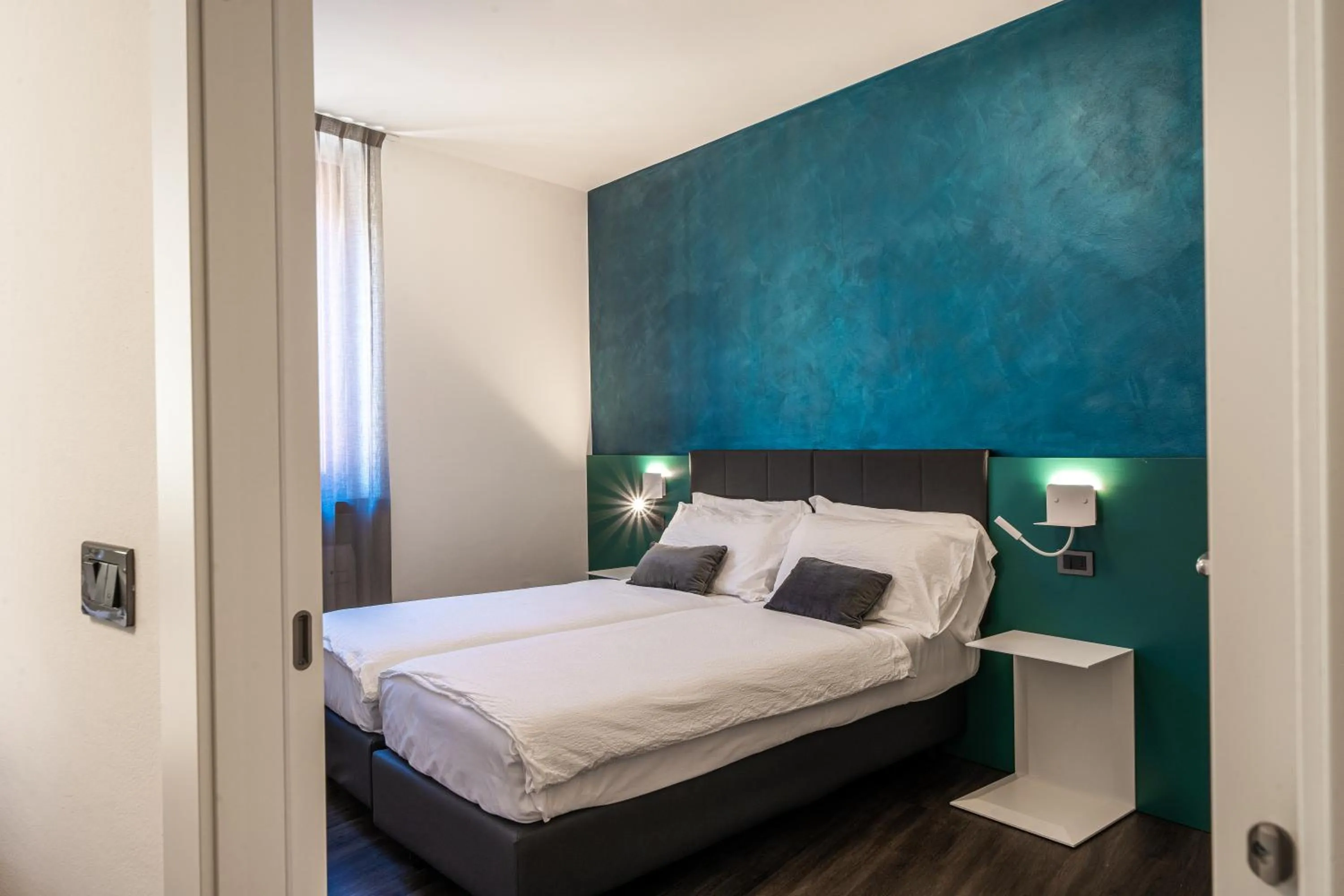 Bedroom, Bed in Appartamenti Vasco Renna Surf Center