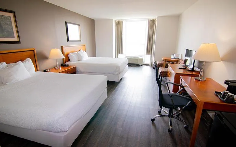 Bed in The Falls Hotel & Inn