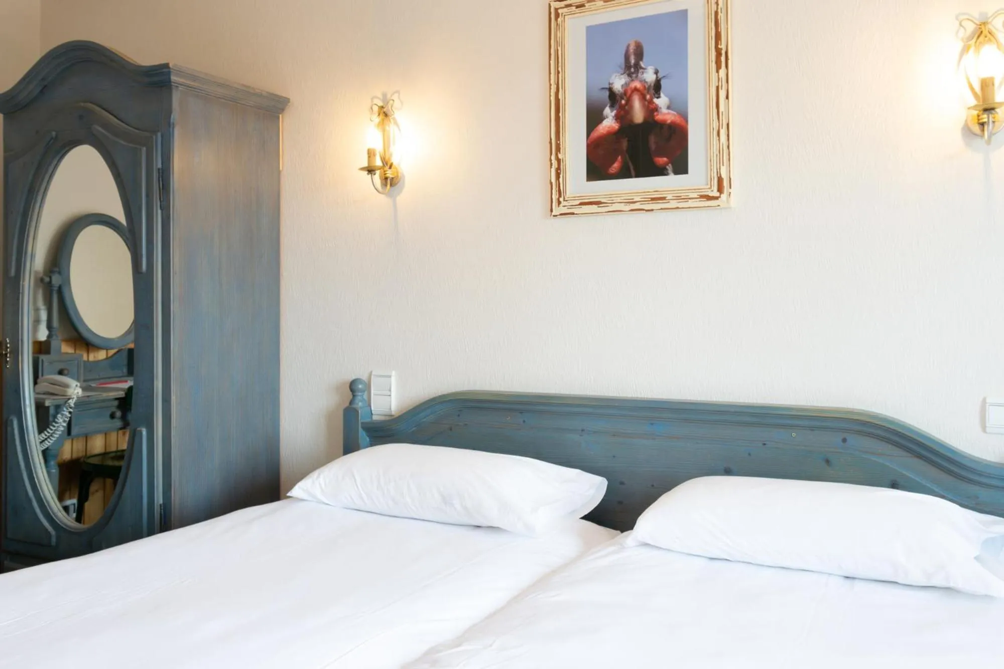 Bed in Hôtel de la Poste