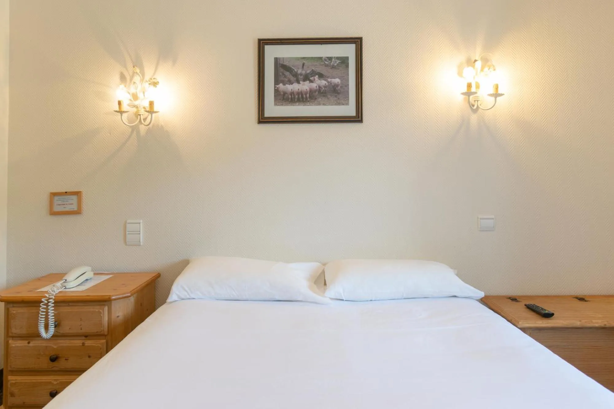 Bed in Hôtel de la Poste