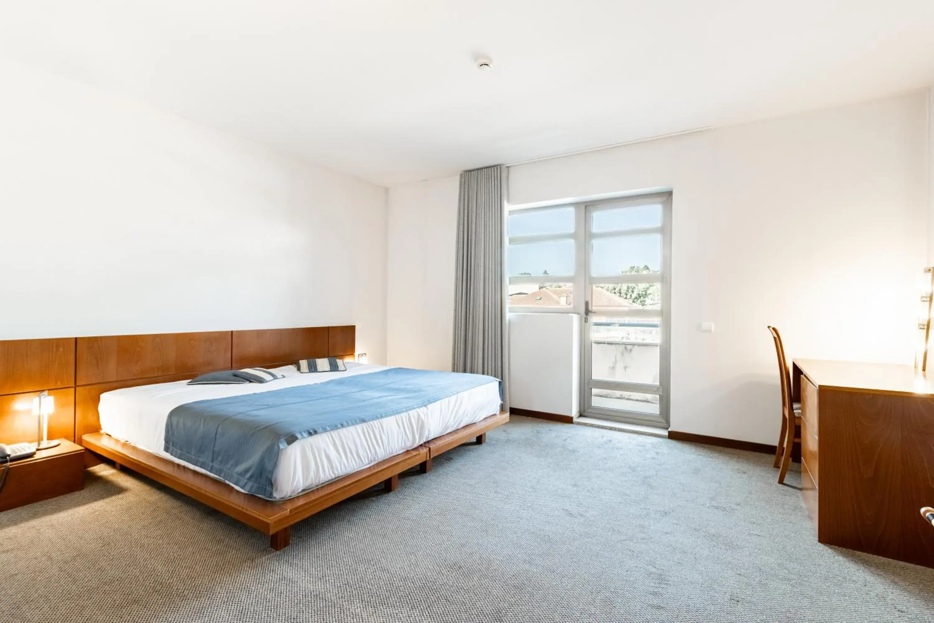 Bed in Hotel La Fontaine Bed in Hotel La Fontaine