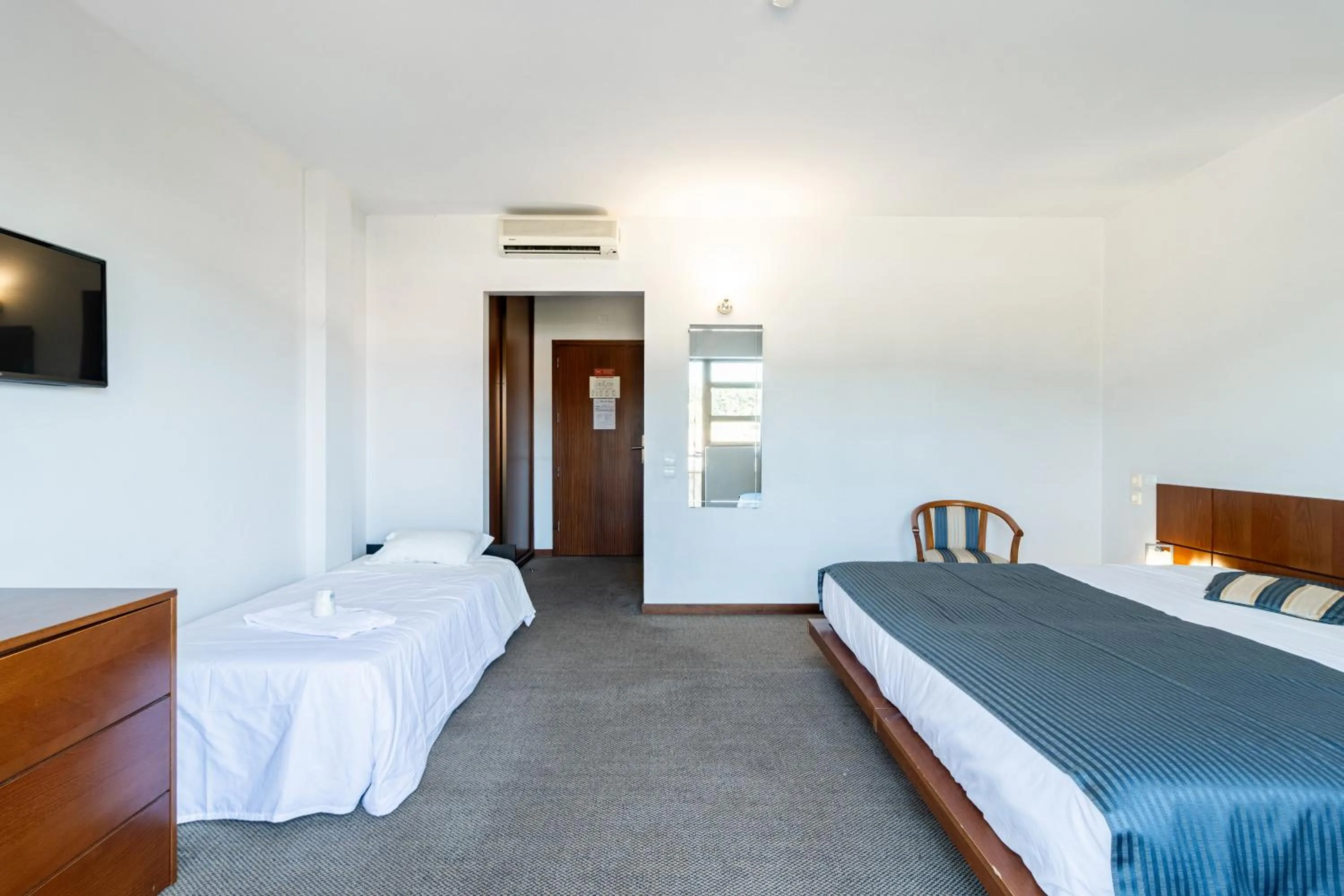 Bed in Hotel La Fontaine