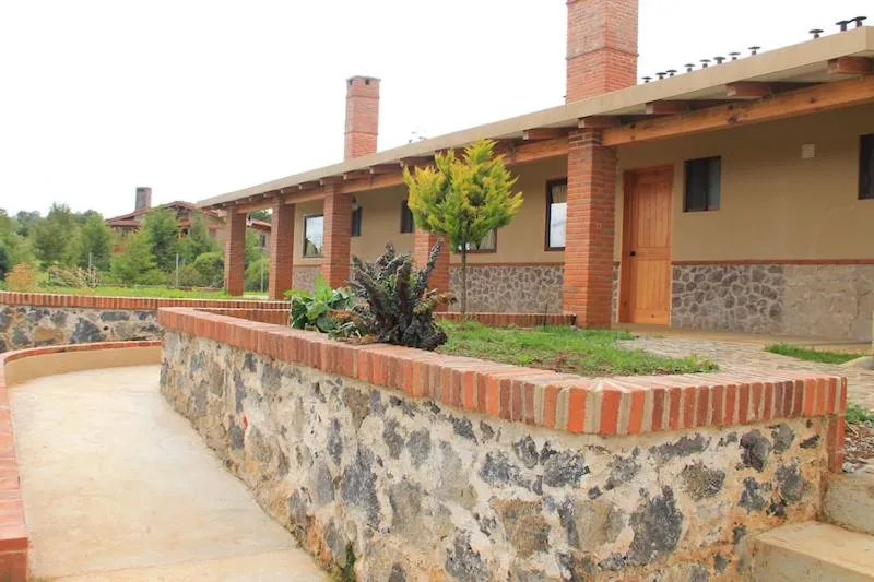 Garden in HOTEL Y CABAÑAS MOUNTAIN LODGE