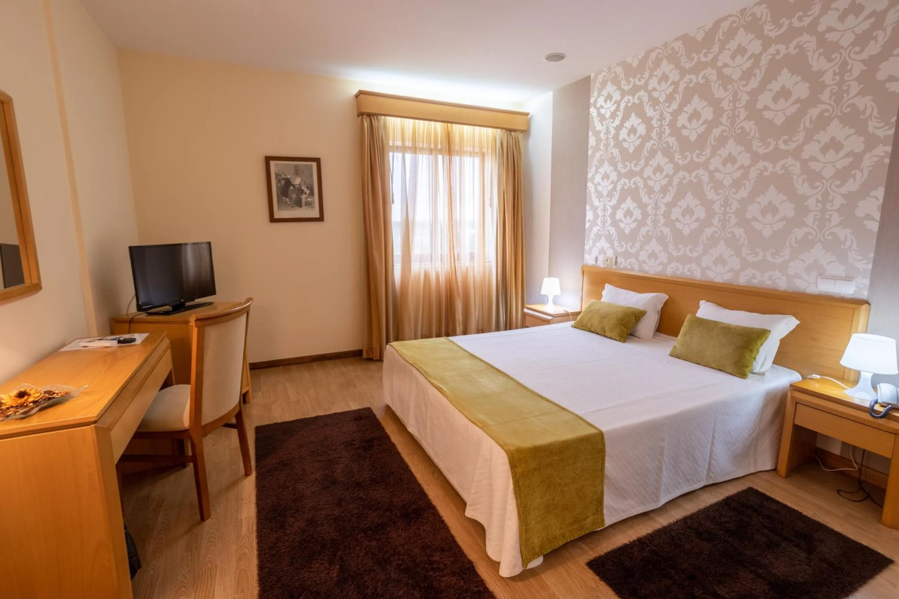 Bed in Hotel Eurosol Alcanena