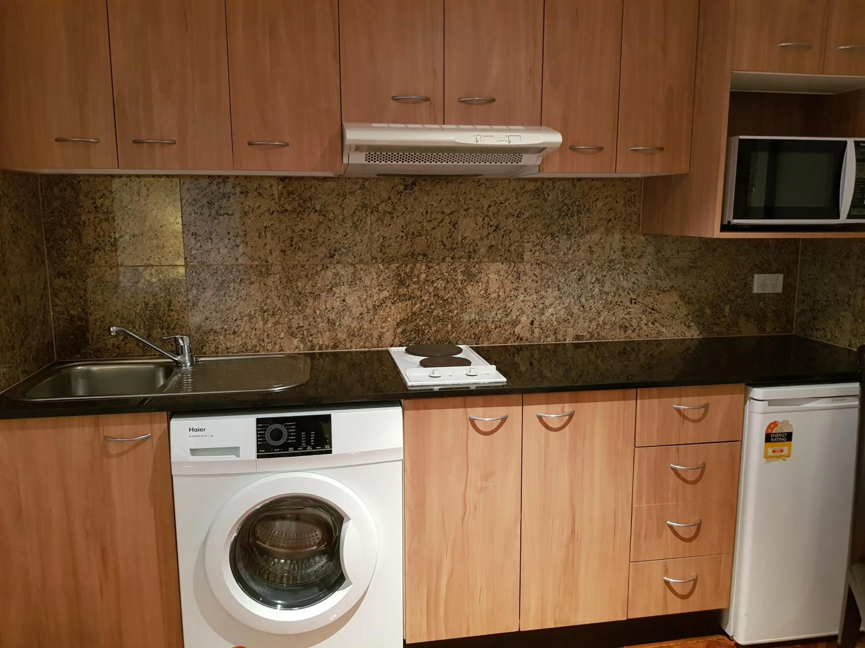 Kitchen or kitchenette in Accommodation Sydney Darling Harbour