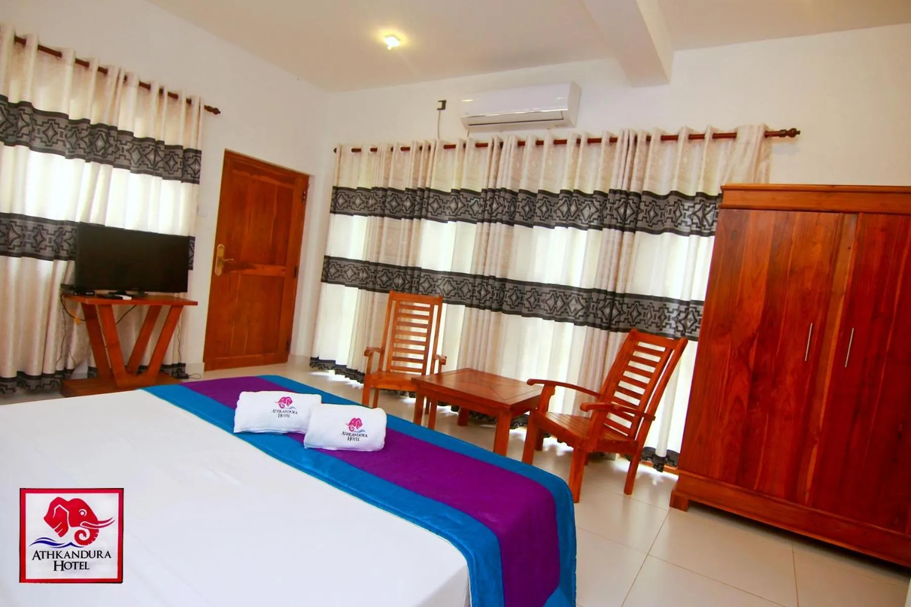 Photo of the whole room, Bed in Athkandura Hotel