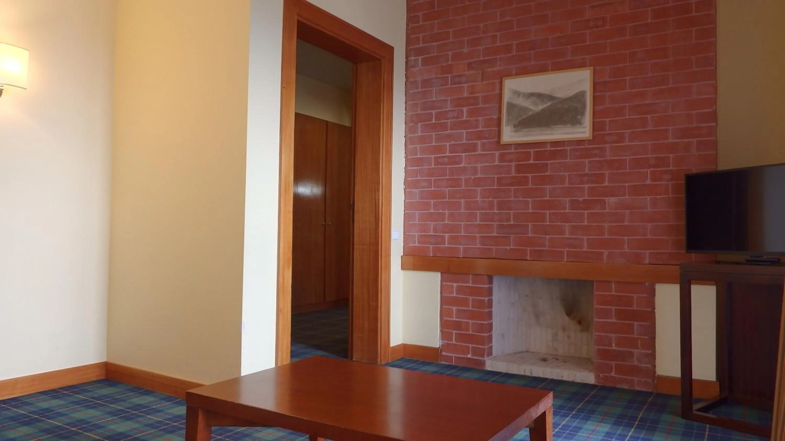 Living room in Golden Tulip Caramulo