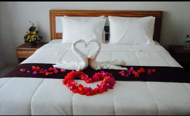 Bed in Tanjung Sari Inn