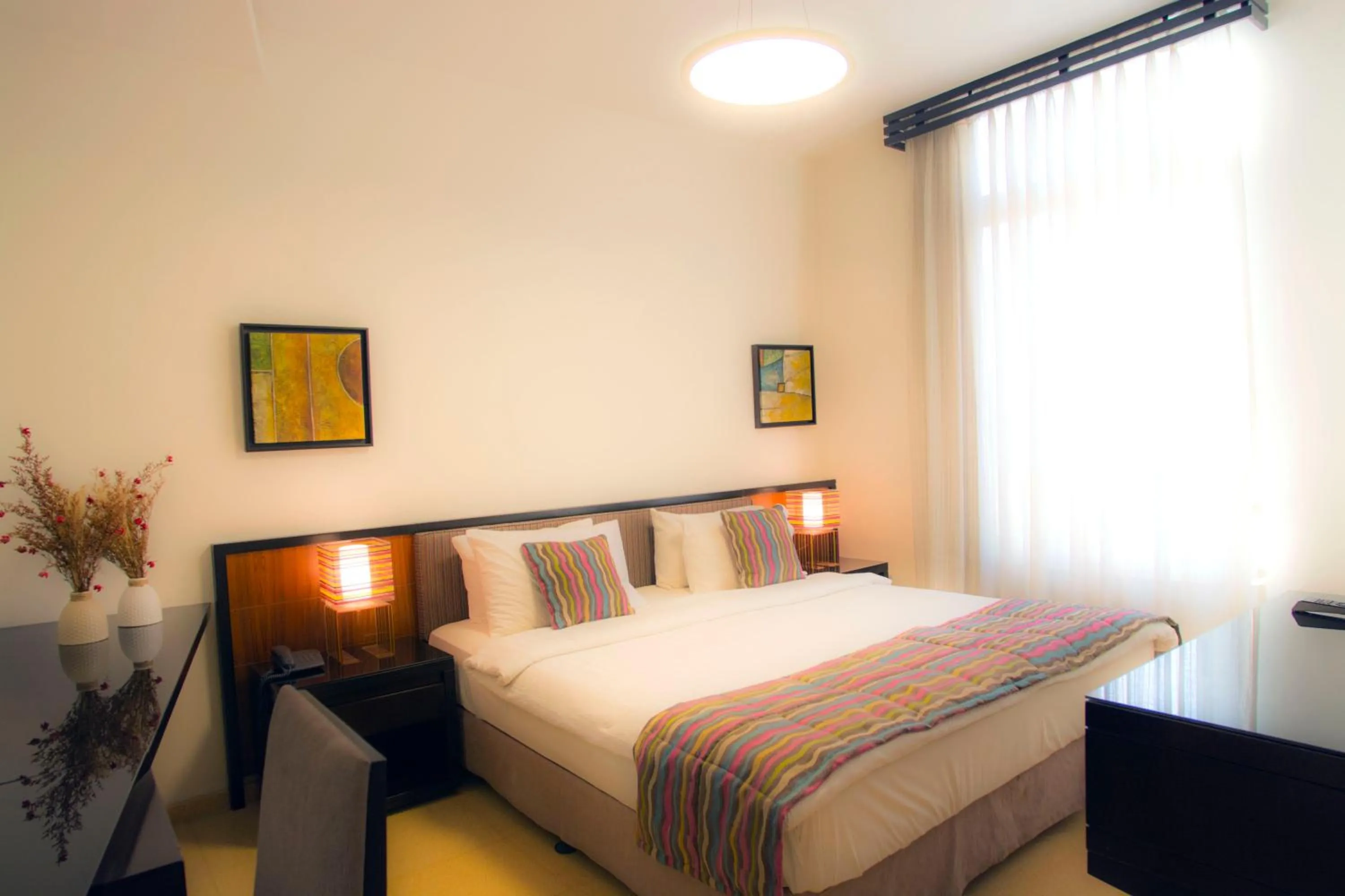 Bed in Burda 41 Hotel & Suites