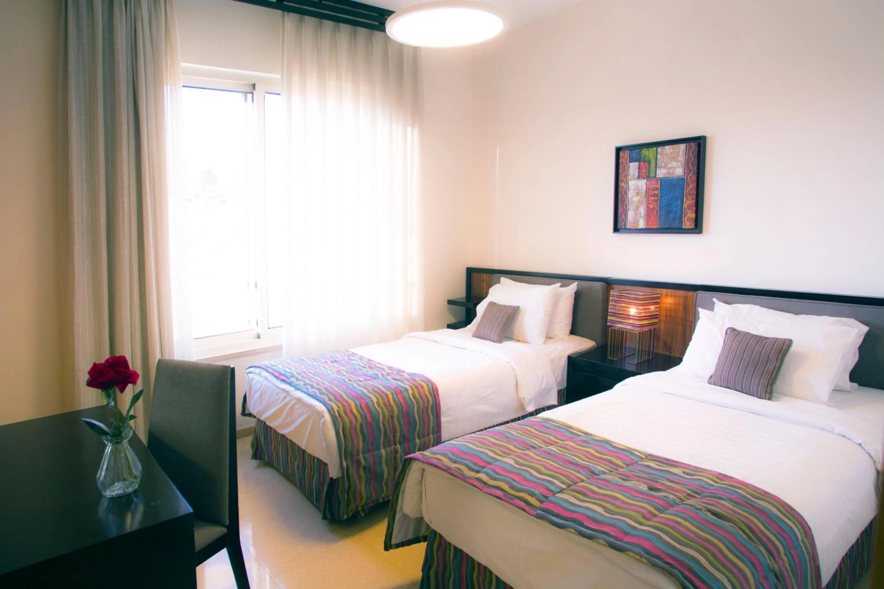 Bed in Burda 41 Hotel & Suites